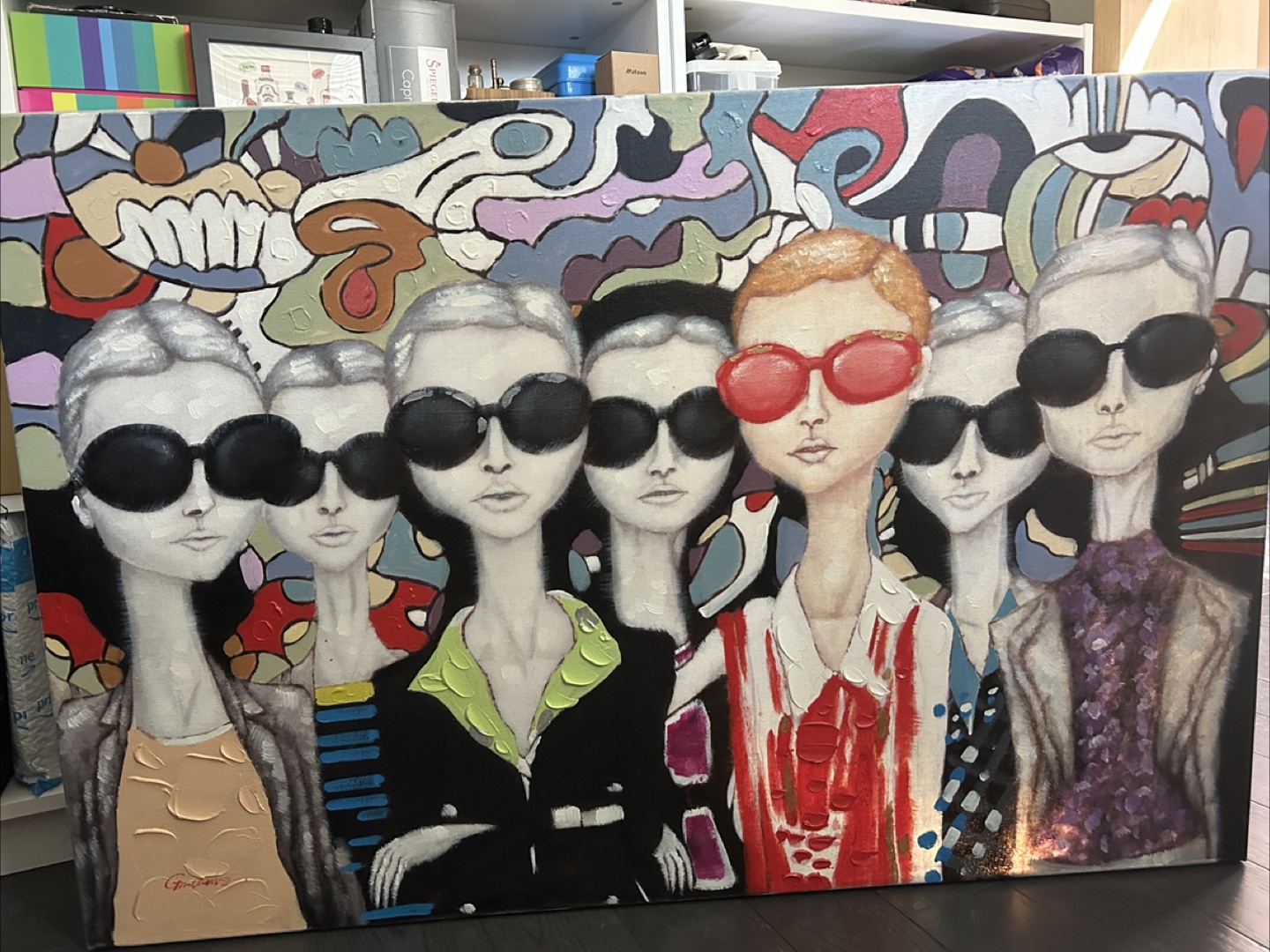 Ground of 7 woman wearing sunglasses against Colorful backdrop