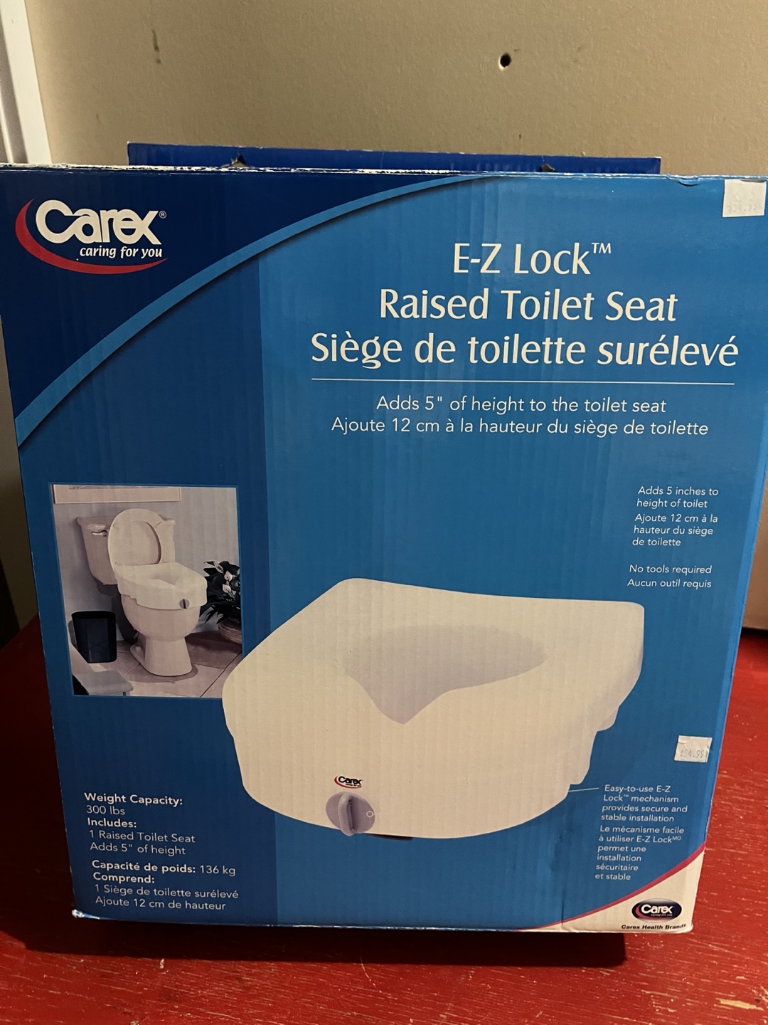Carex E-Z Lock Raised Toilet Seat with arm