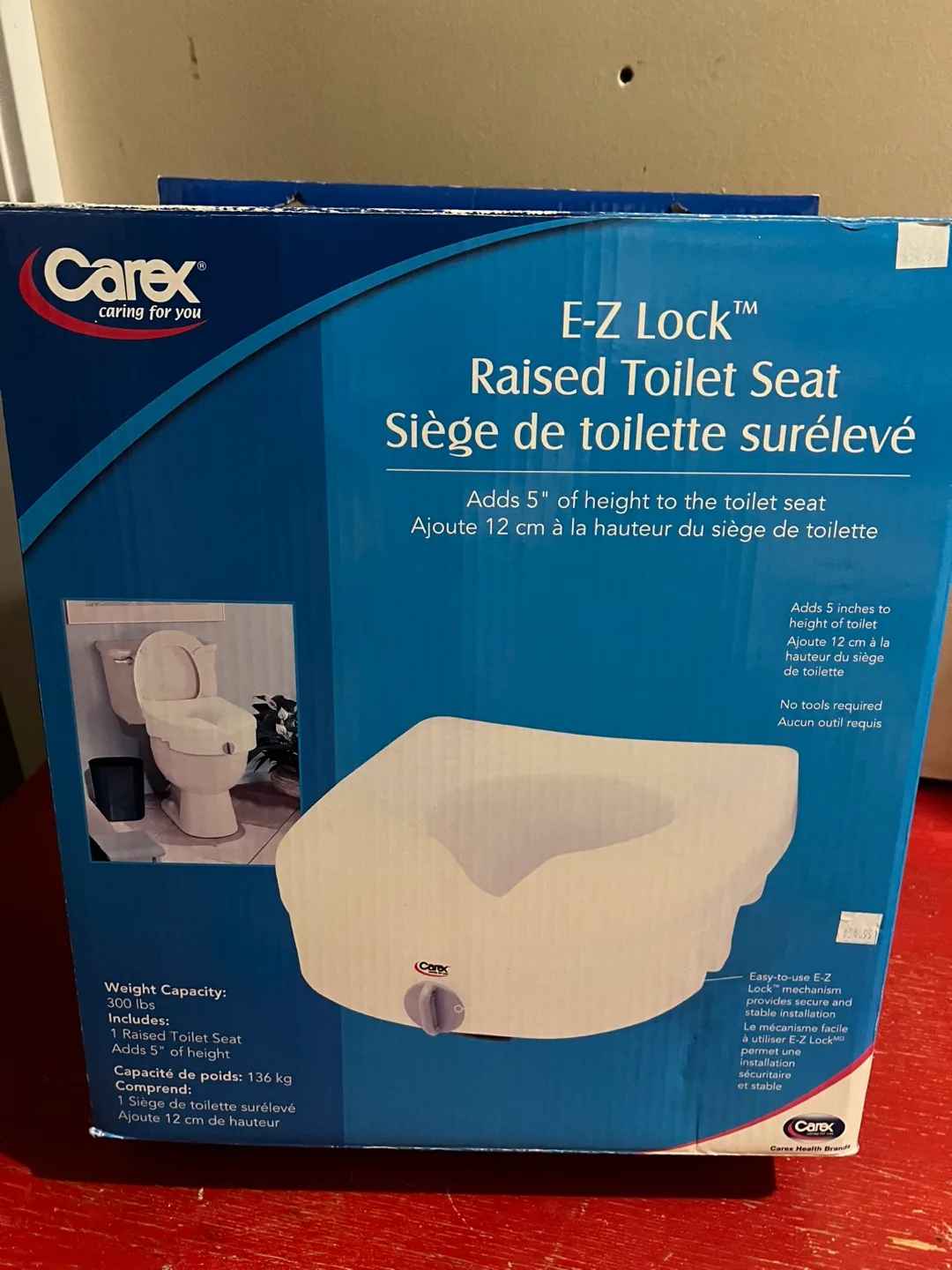 Carex E-Z Lock Raised Toilet Seat with arm thumbnail