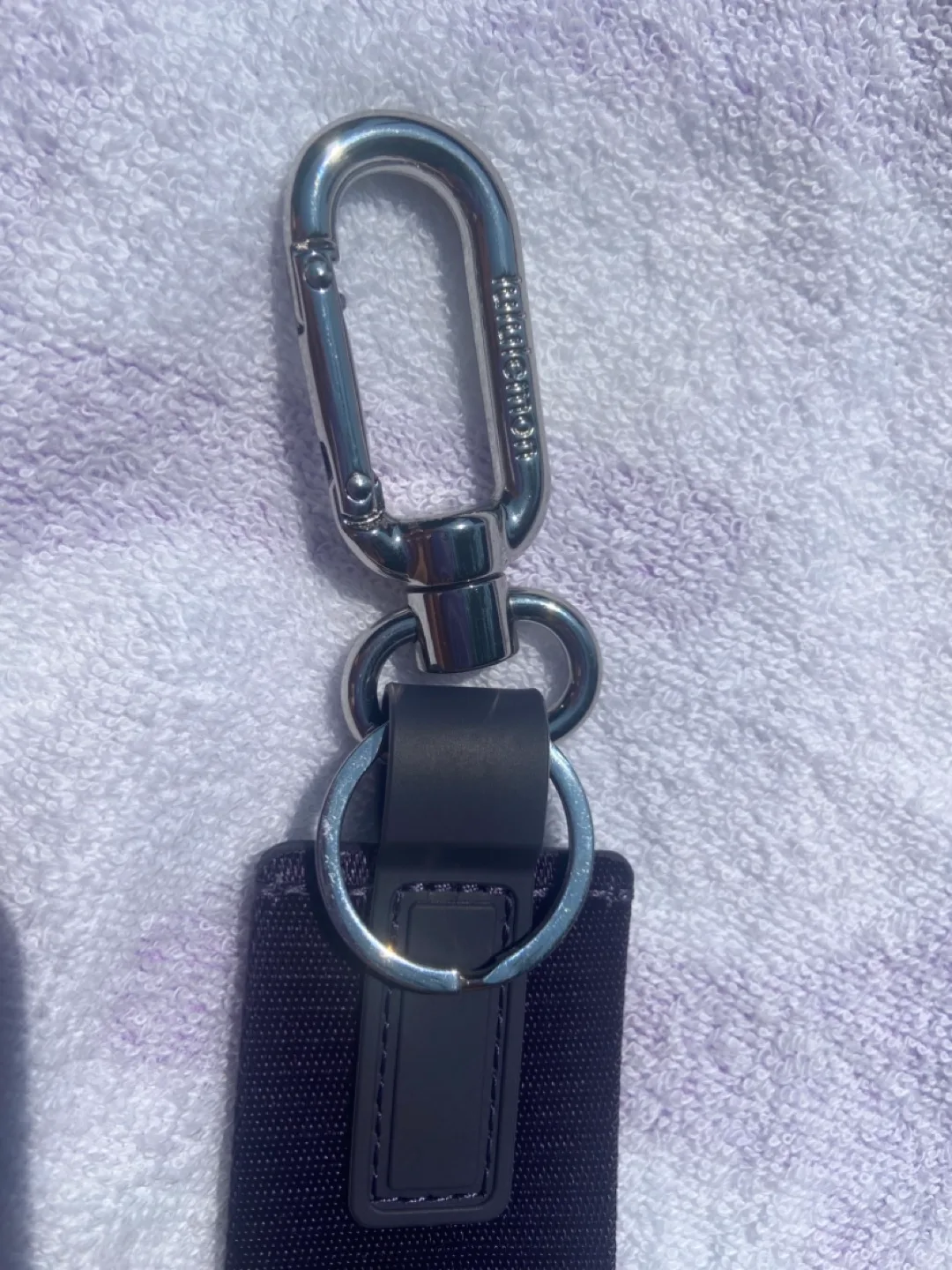 Lululemon Never lost keychain image indicator(2)