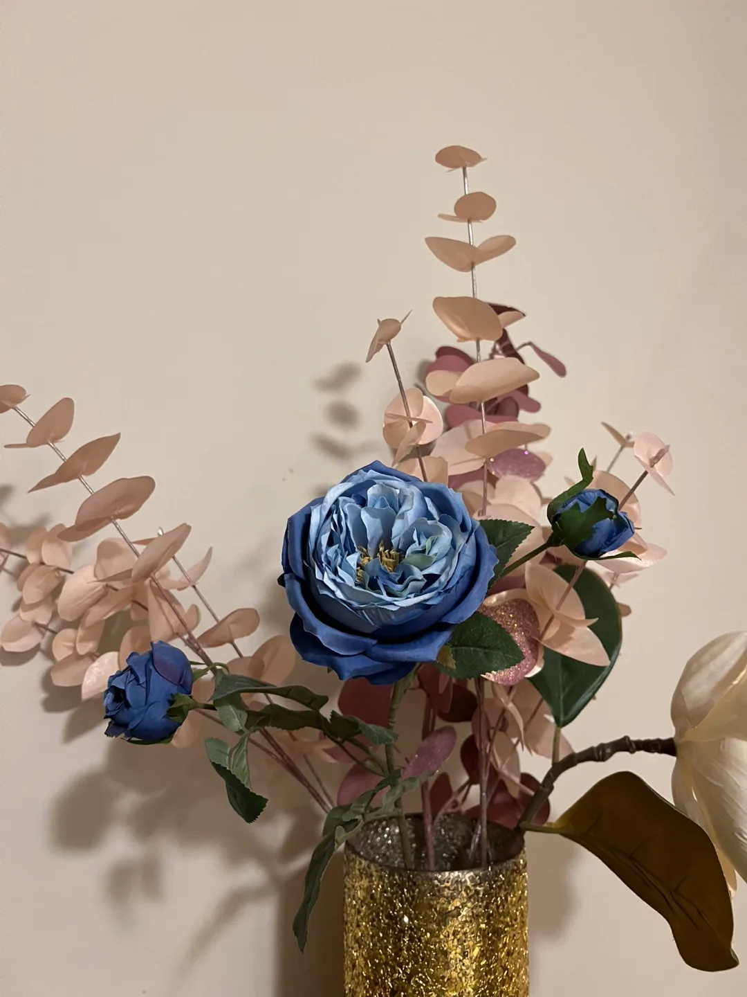 Glass Vase and a Golden sparkle Vase with artificial flowers image indicator(3)