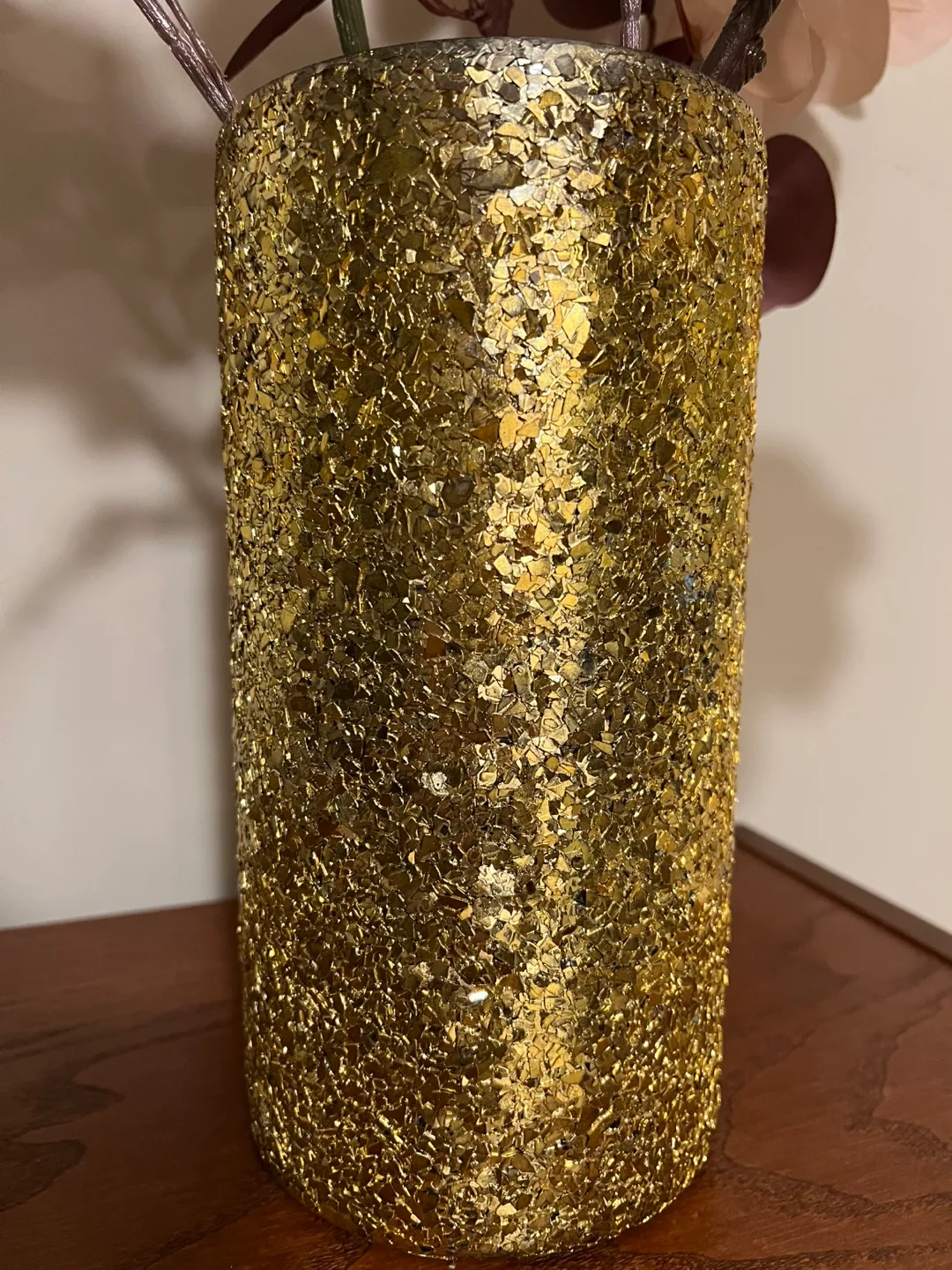 Glass Vase and a Golden sparkle Vase with artificial flowers image indicator(2)