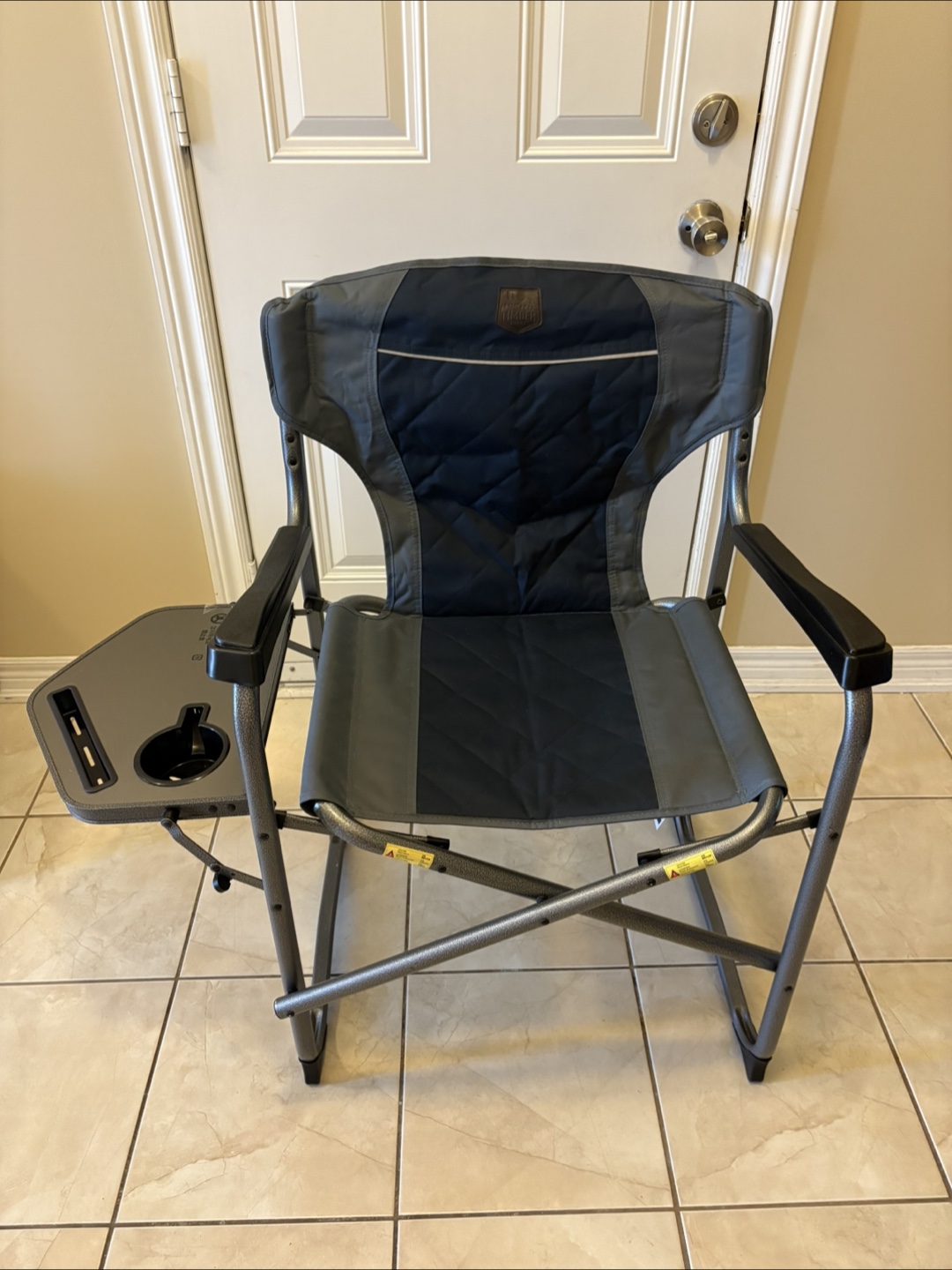 Folding camping chair with side table