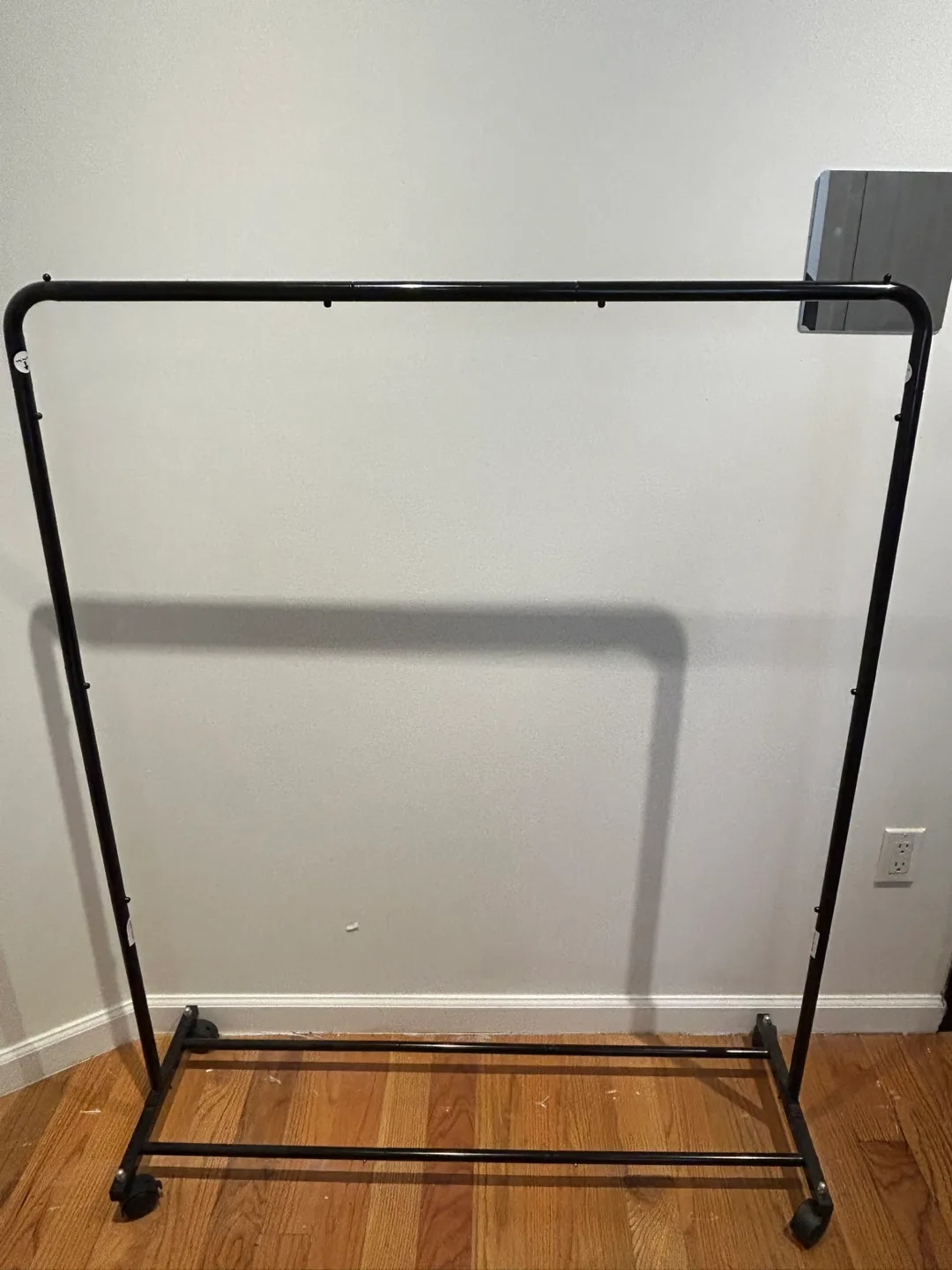 MOVEOUT SALE: Black Rolling Clothes Rack thumbnail