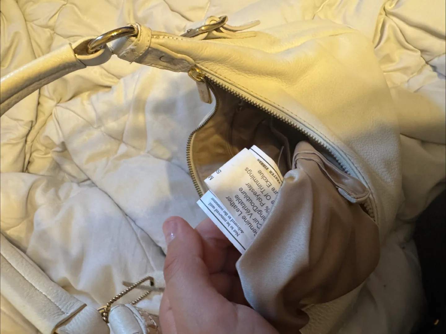 white danier leather hobo bag image indicator(3)