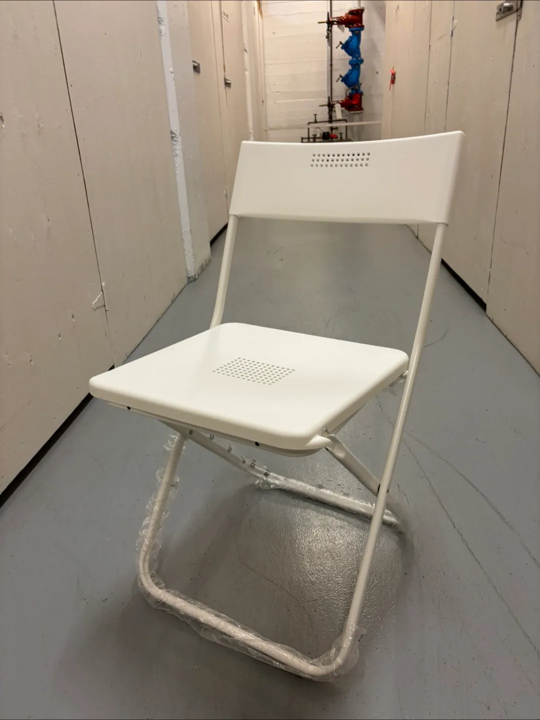 Ikea white folding chair thumbnail