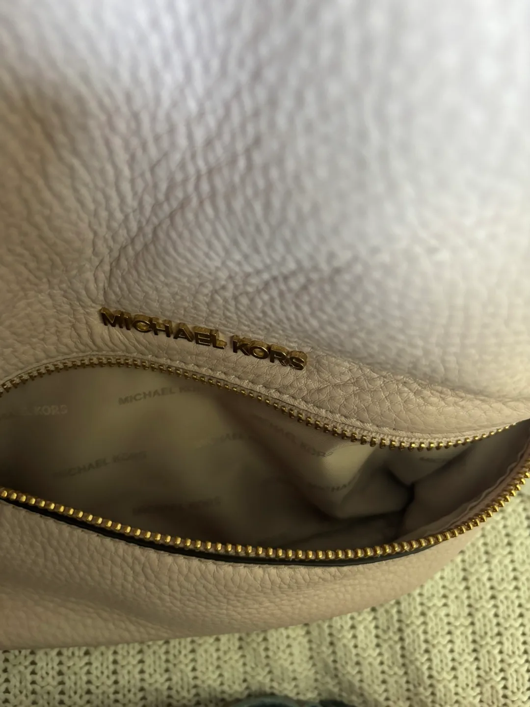 MK Rhea Medium Pebbled Leather Soft Pink Backpack image indicator(9)