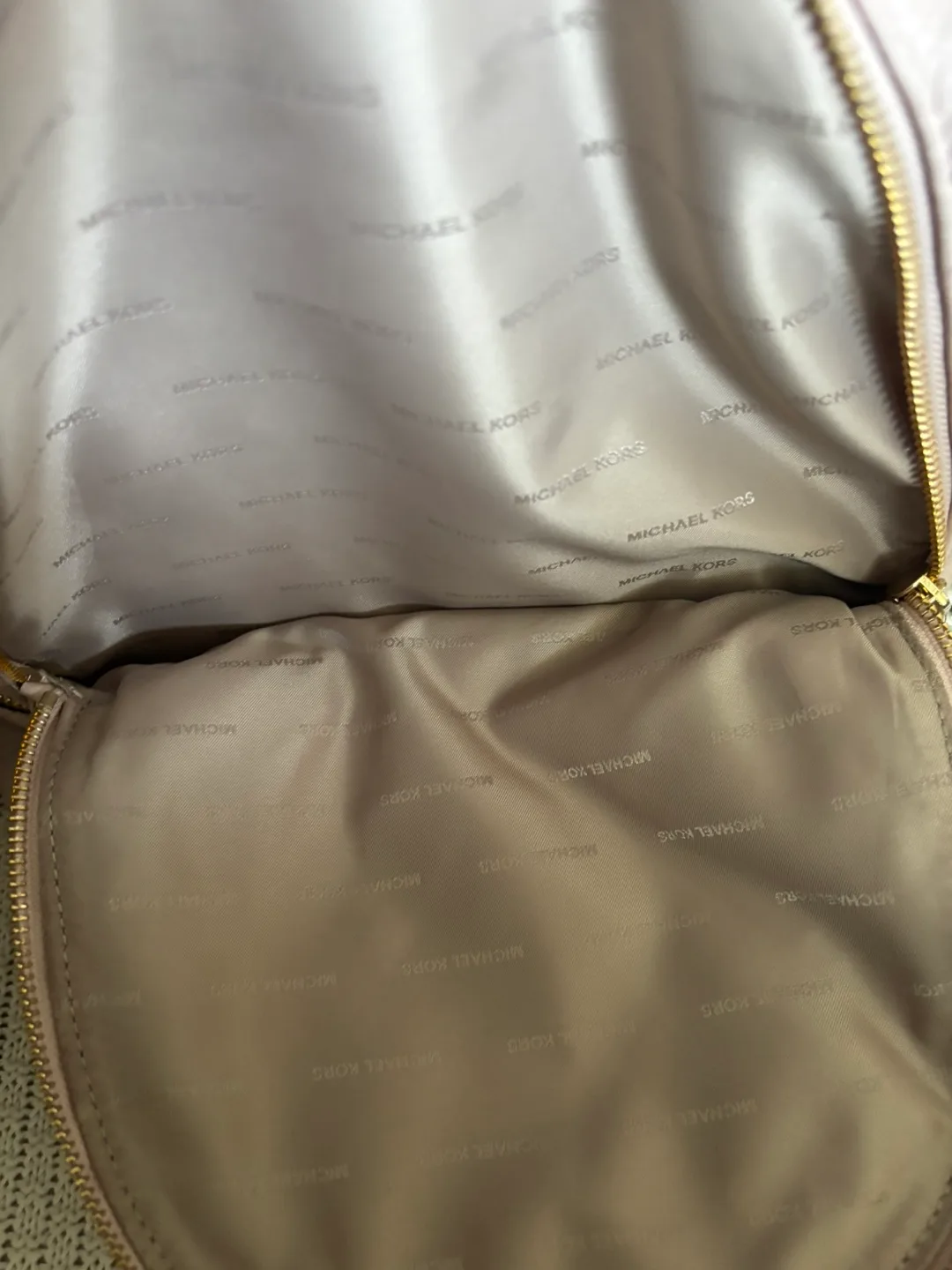 MK Rhea Medium Pebbled Leather Soft Pink Backpack image indicator(7)