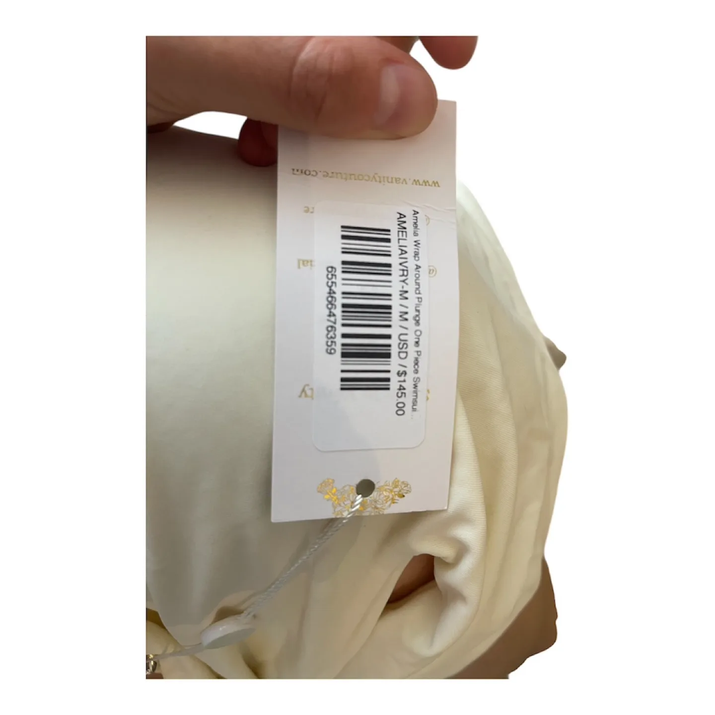 NWT White Monokini Cut Out Swimsuit Medium image indicator(7)