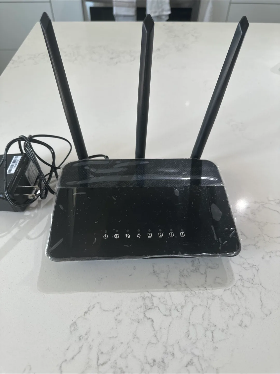 Black Wireless Router with Power Adapter thumbnail