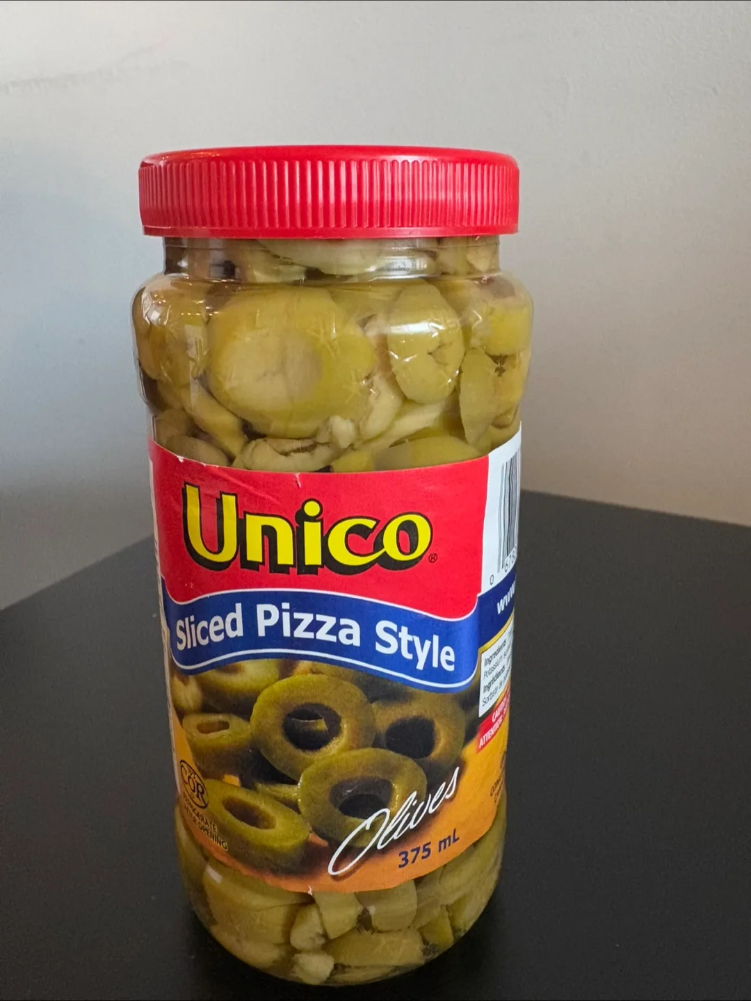 Unopened Unico Sliced Pizza Style Olives - 375 mL thumbnail