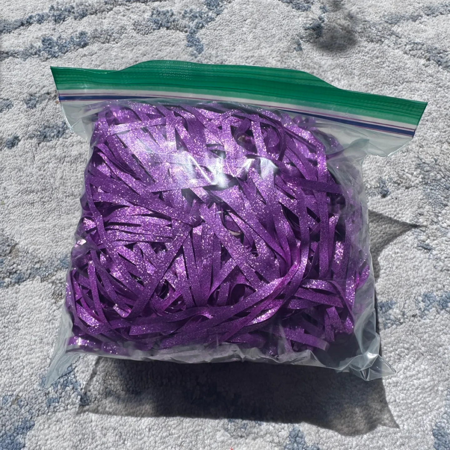 Bag of Purple Glitter Shredded Paper thumbnail