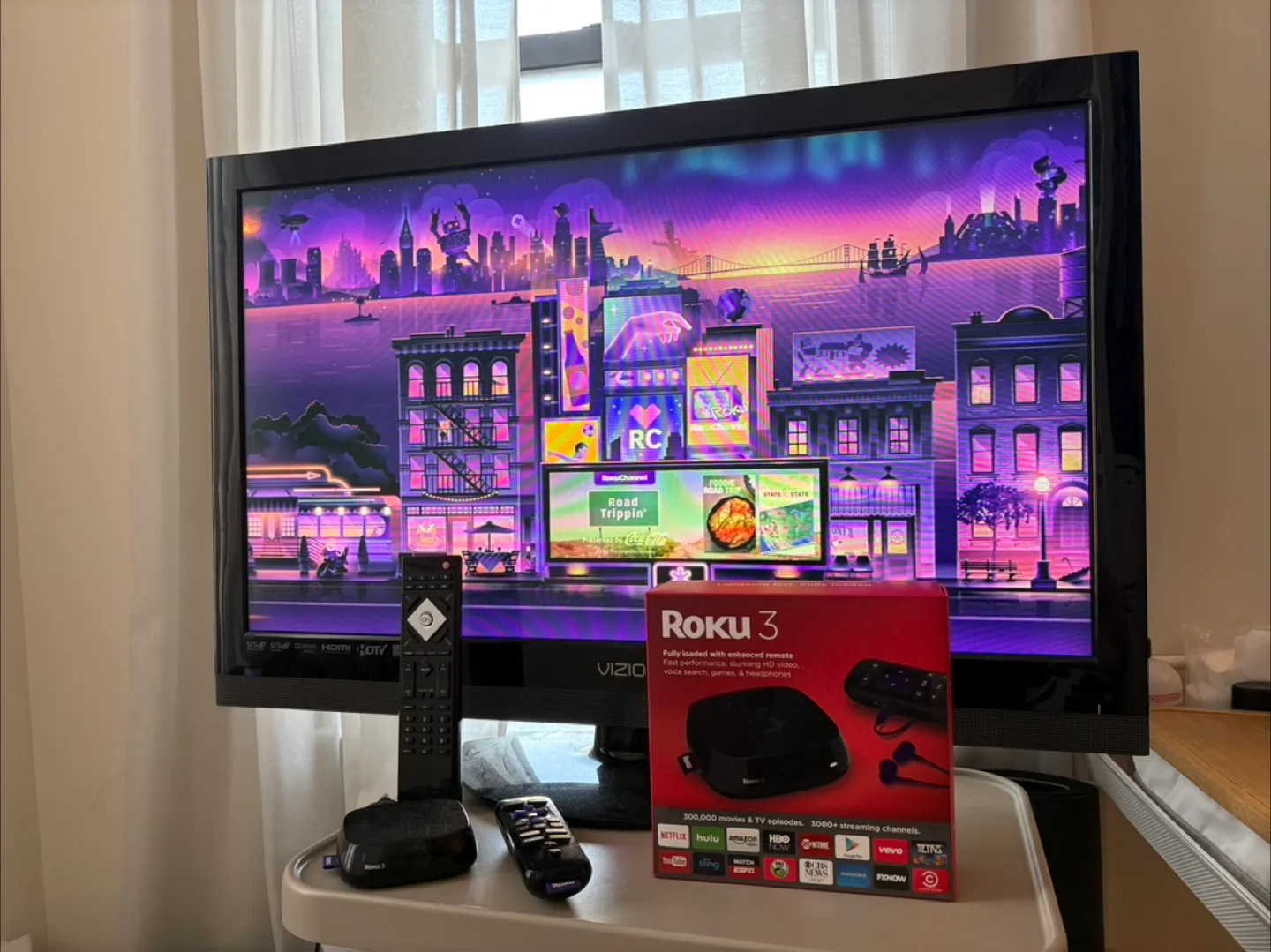 Roku 3 Streaming Player and 36” TV thumbnail