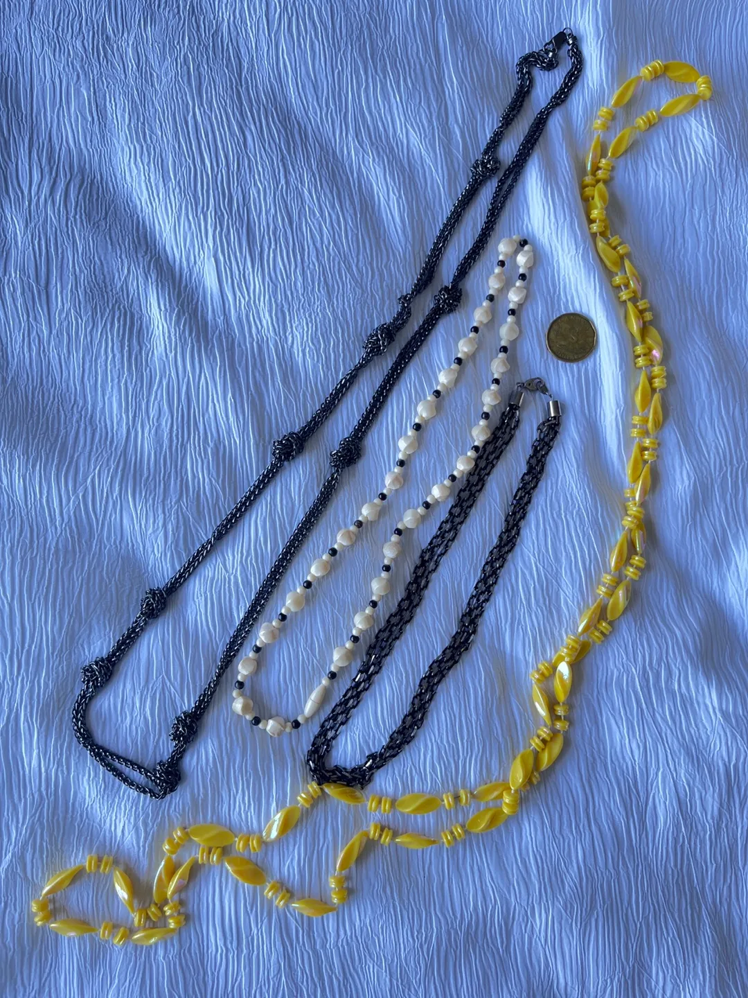 Assorted Necklaces - Black, Pearl, Yellow image indicator(2)