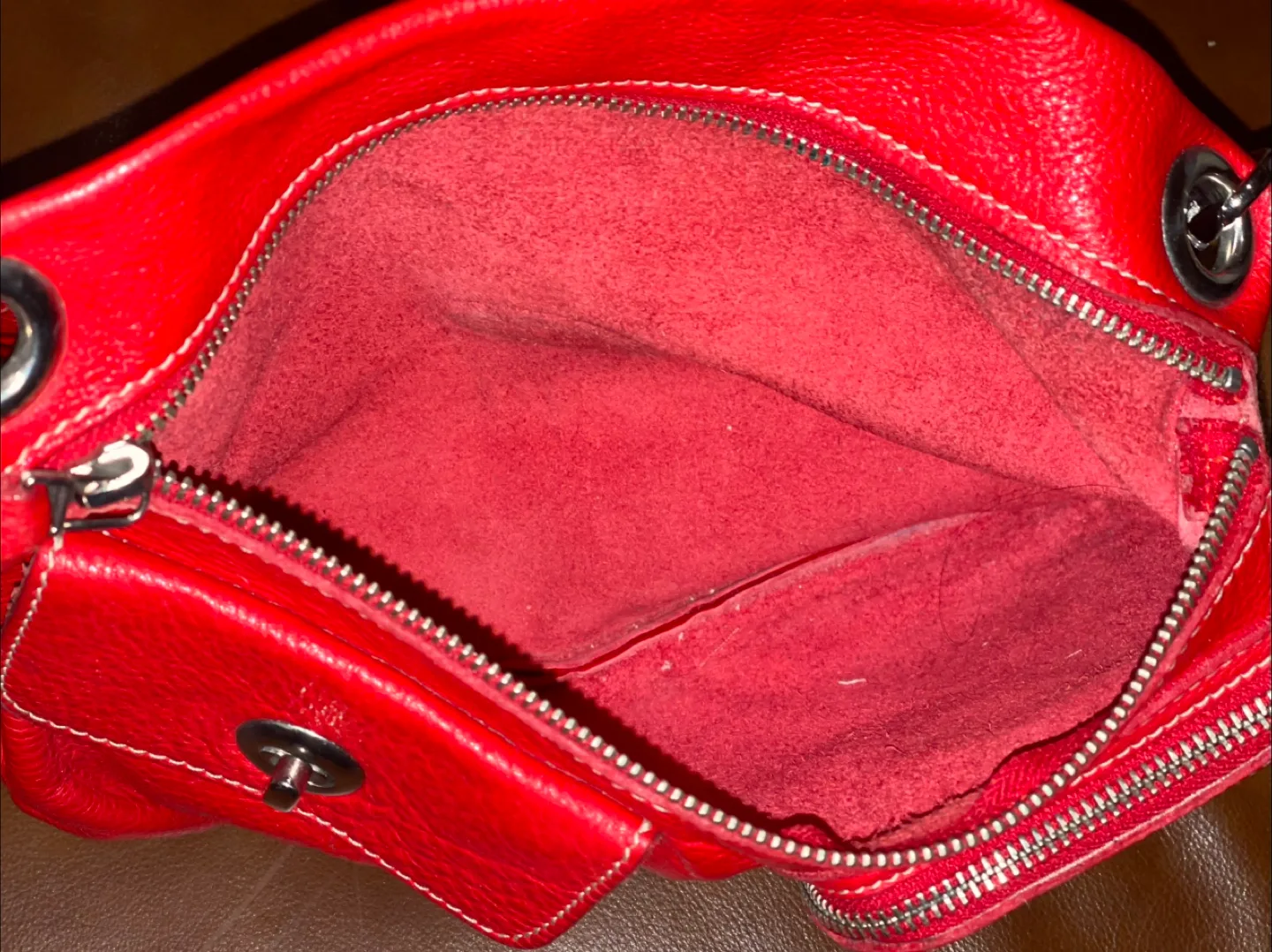 Roots Village Tribe cross body bag in red color image indicator(5)