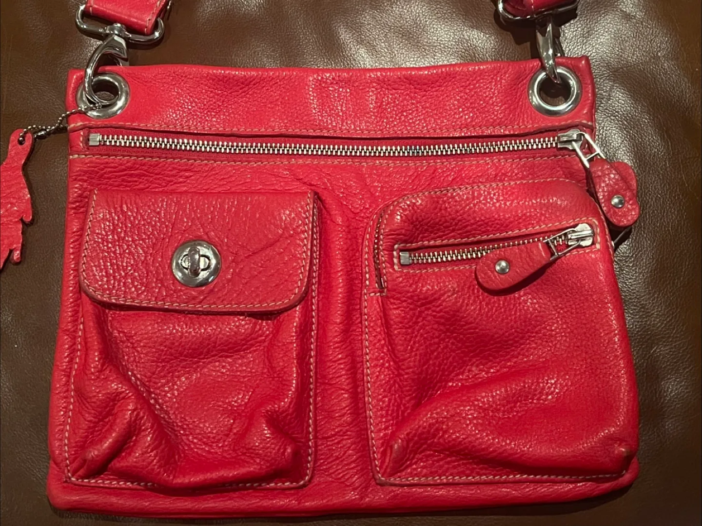 Roots Village Tribe cross body bag in red color image indicator(2)