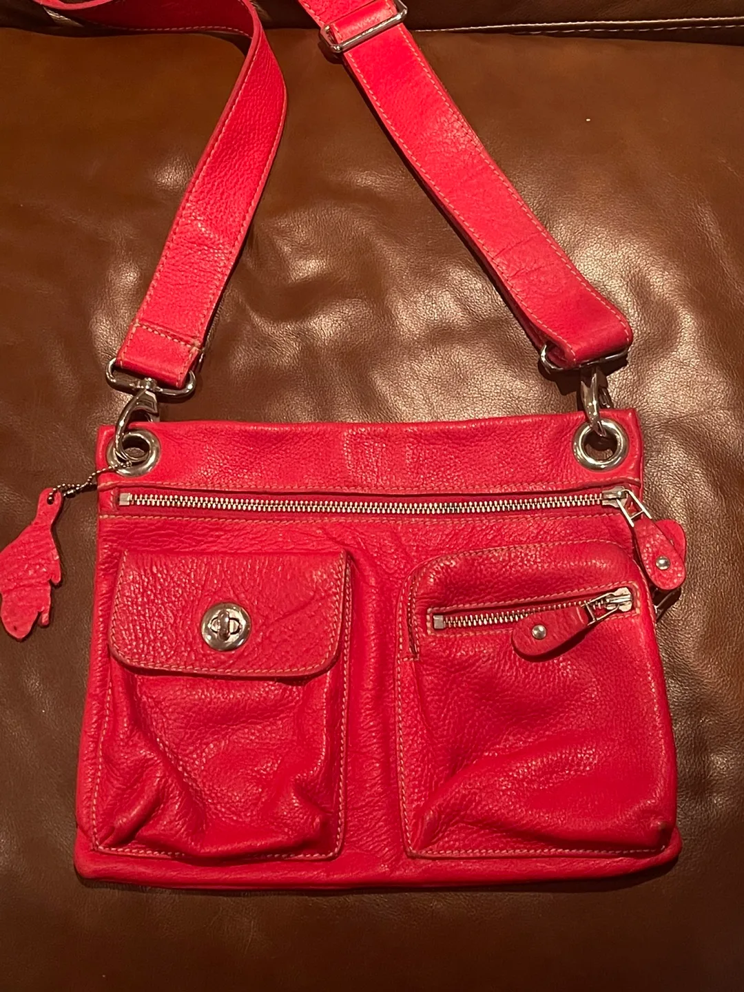 Roots Village Tribe cross body bag in red color thumbnail