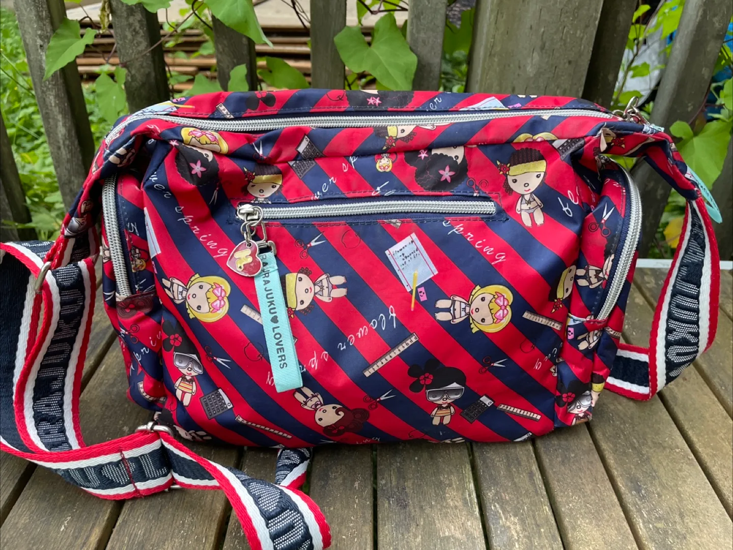 Harajuku Lovers Red & Blue Striped Shoulder Bag image indicator(6)