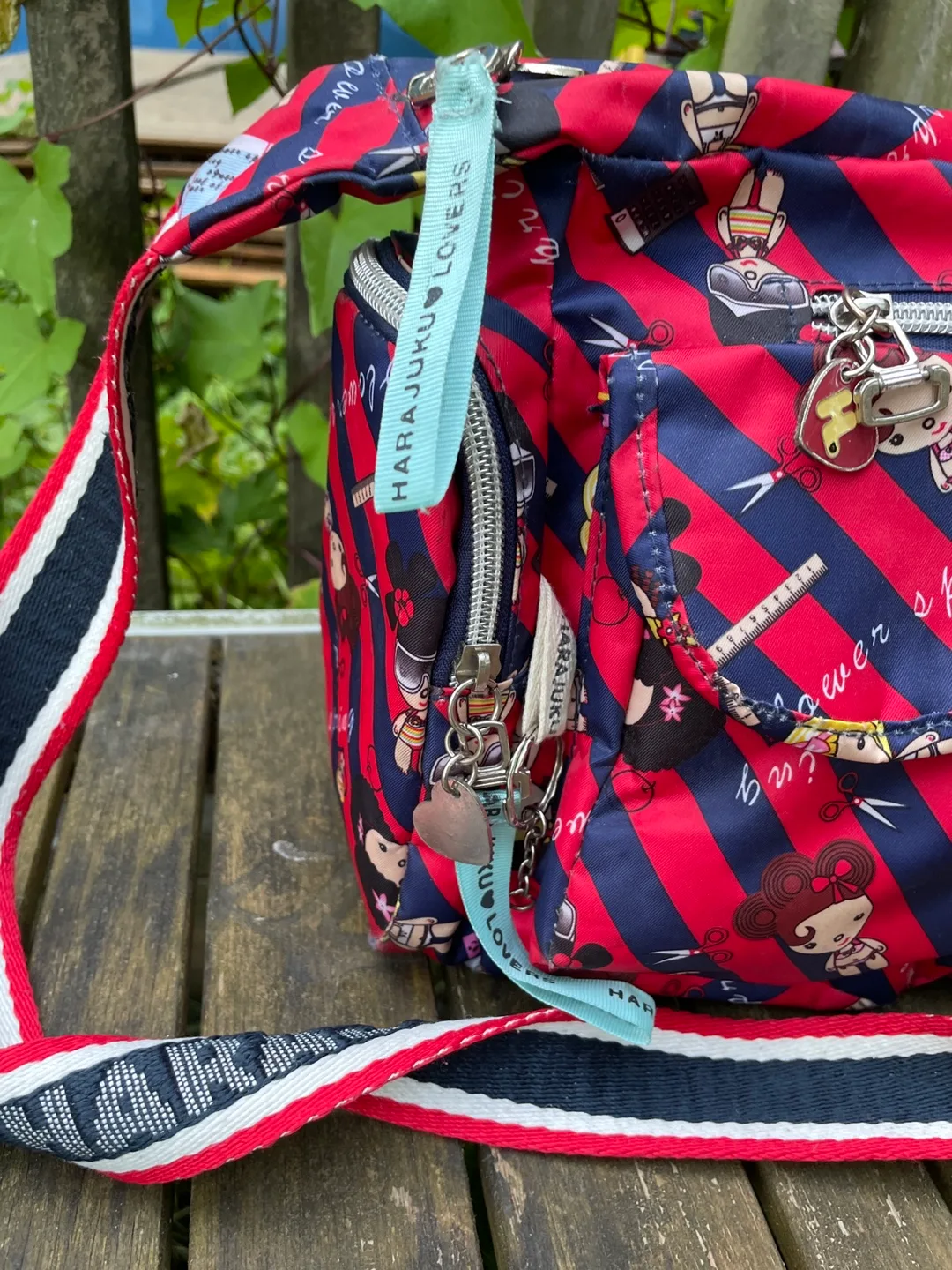Harajuku Lovers Red & Blue Striped Shoulder Bag image indicator(2)