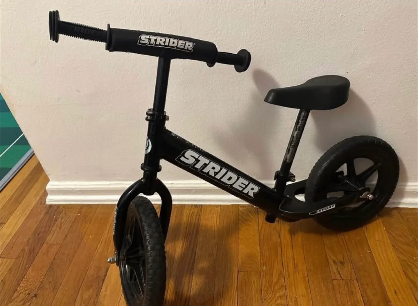 Strider 12 Black Balance Bike - Kids' First Bike thumbnail