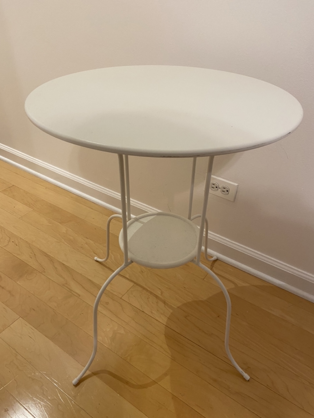 White metal table with small under shelf