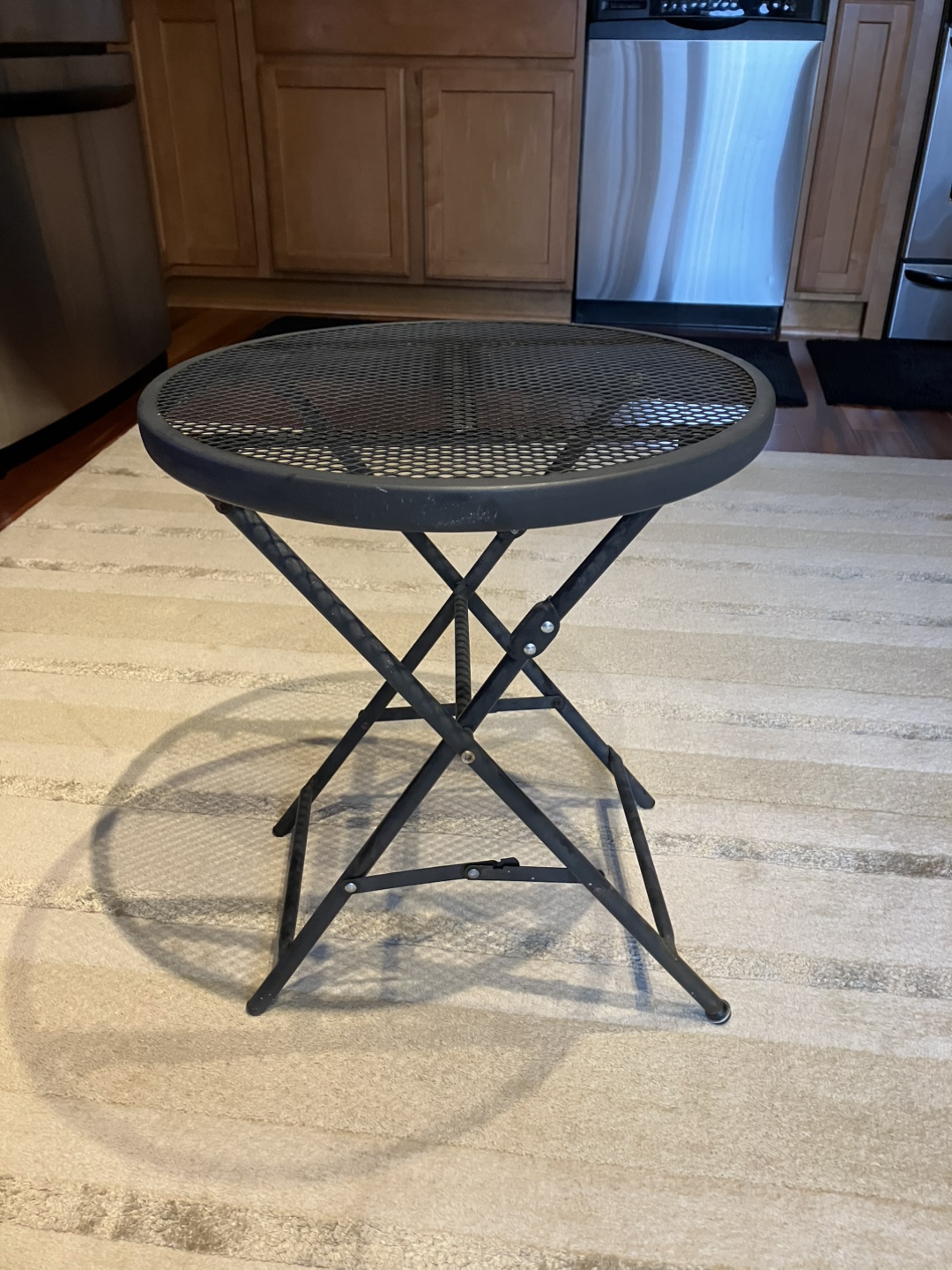 Black metal patio side table