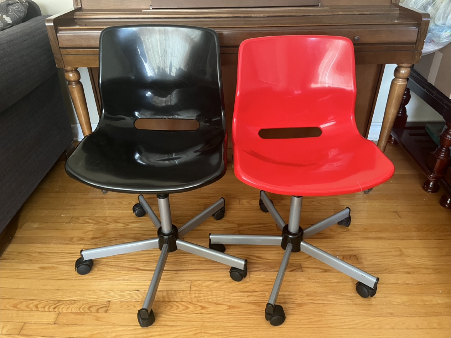 Two Office Chairs - Black and Red