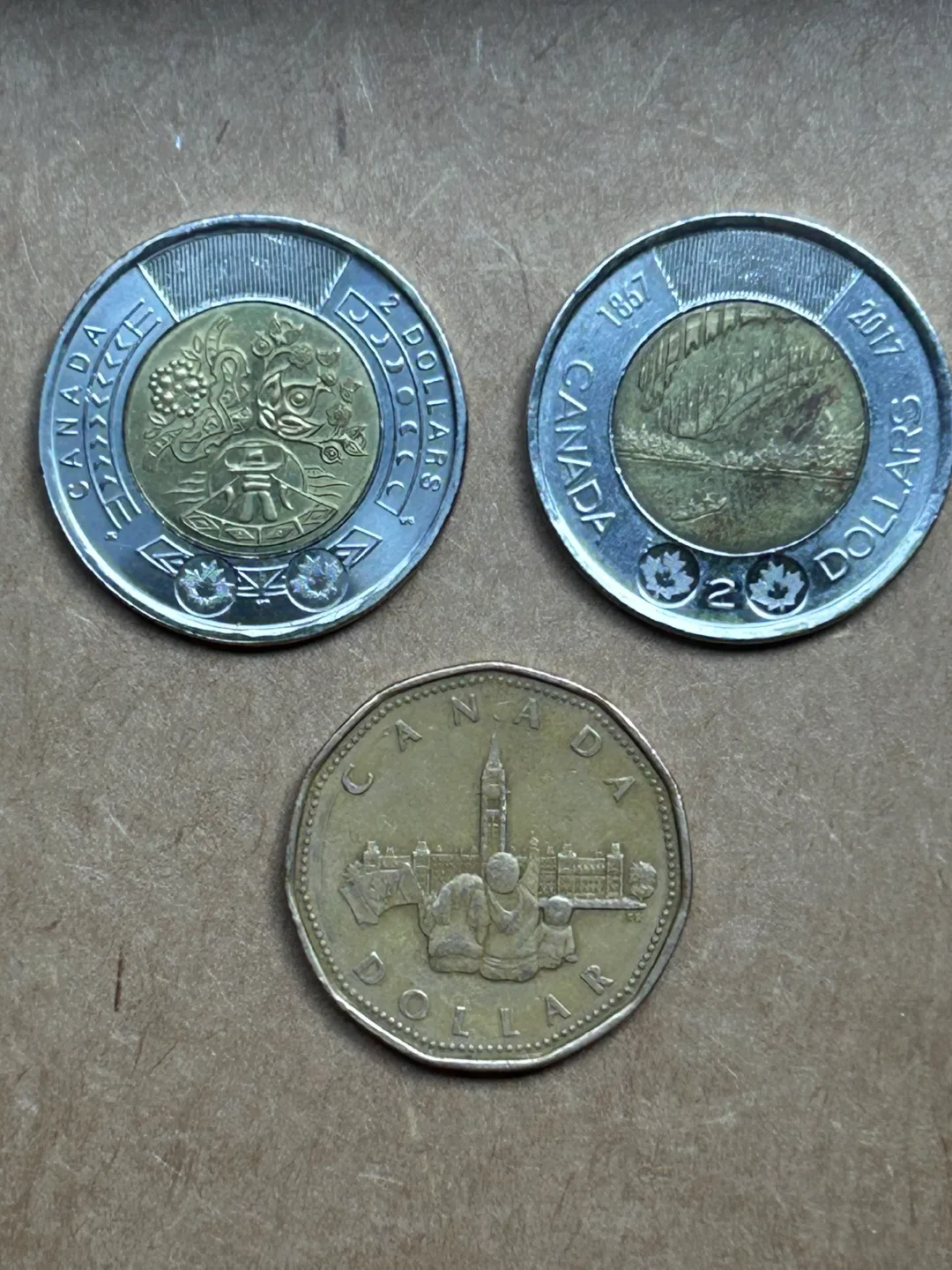 Loonie toonies commemorative coin money Canada thumbnail