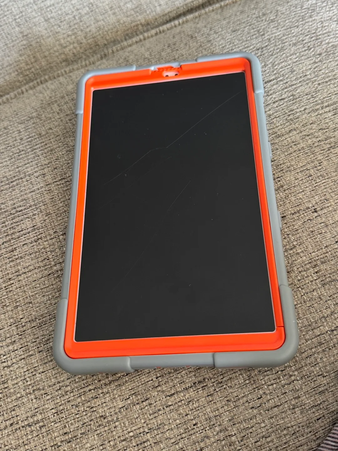 Tablet with Gray and Orange Case image indicator(3)