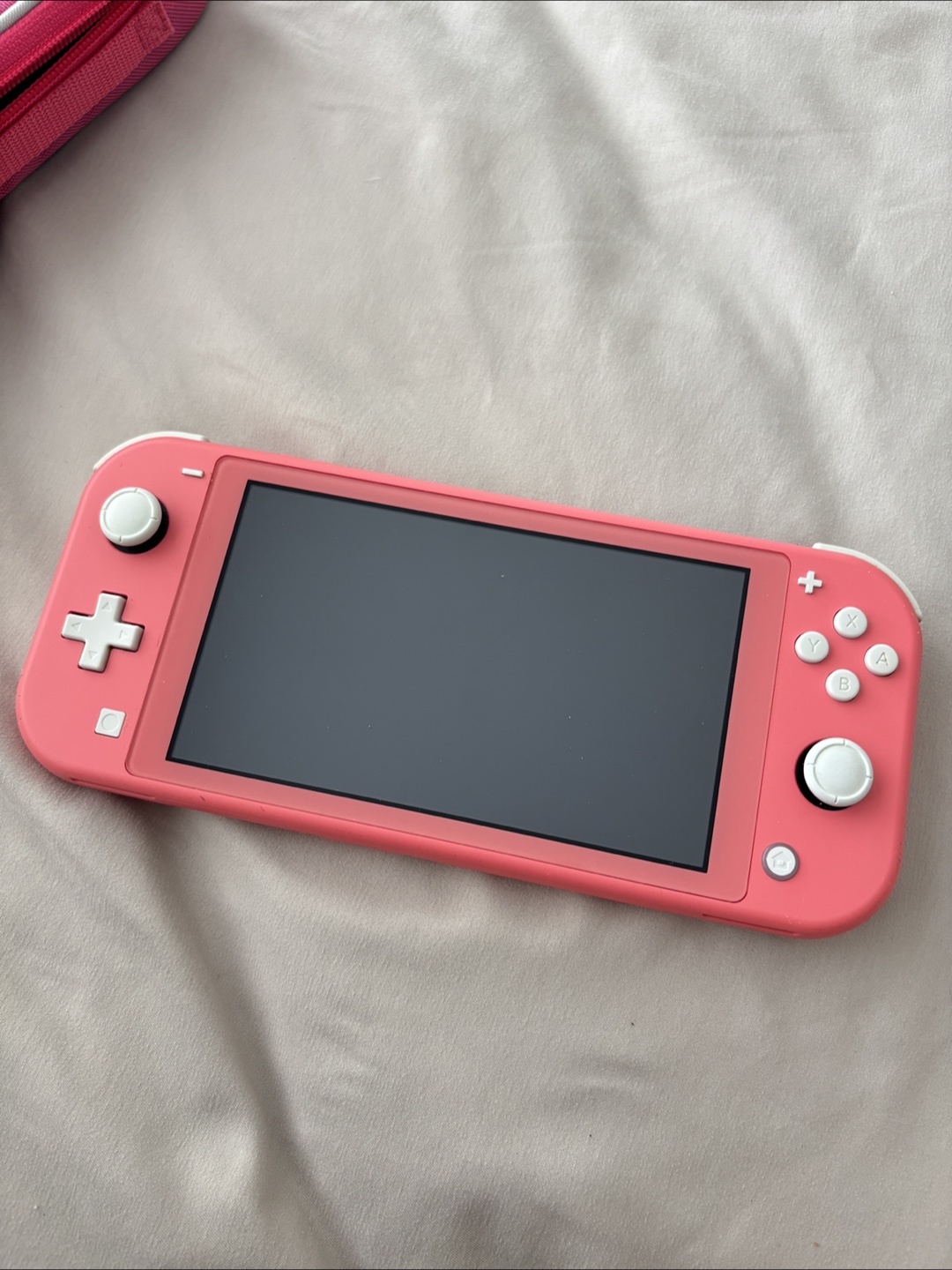 Nintendo Switch Lite Coral with Case