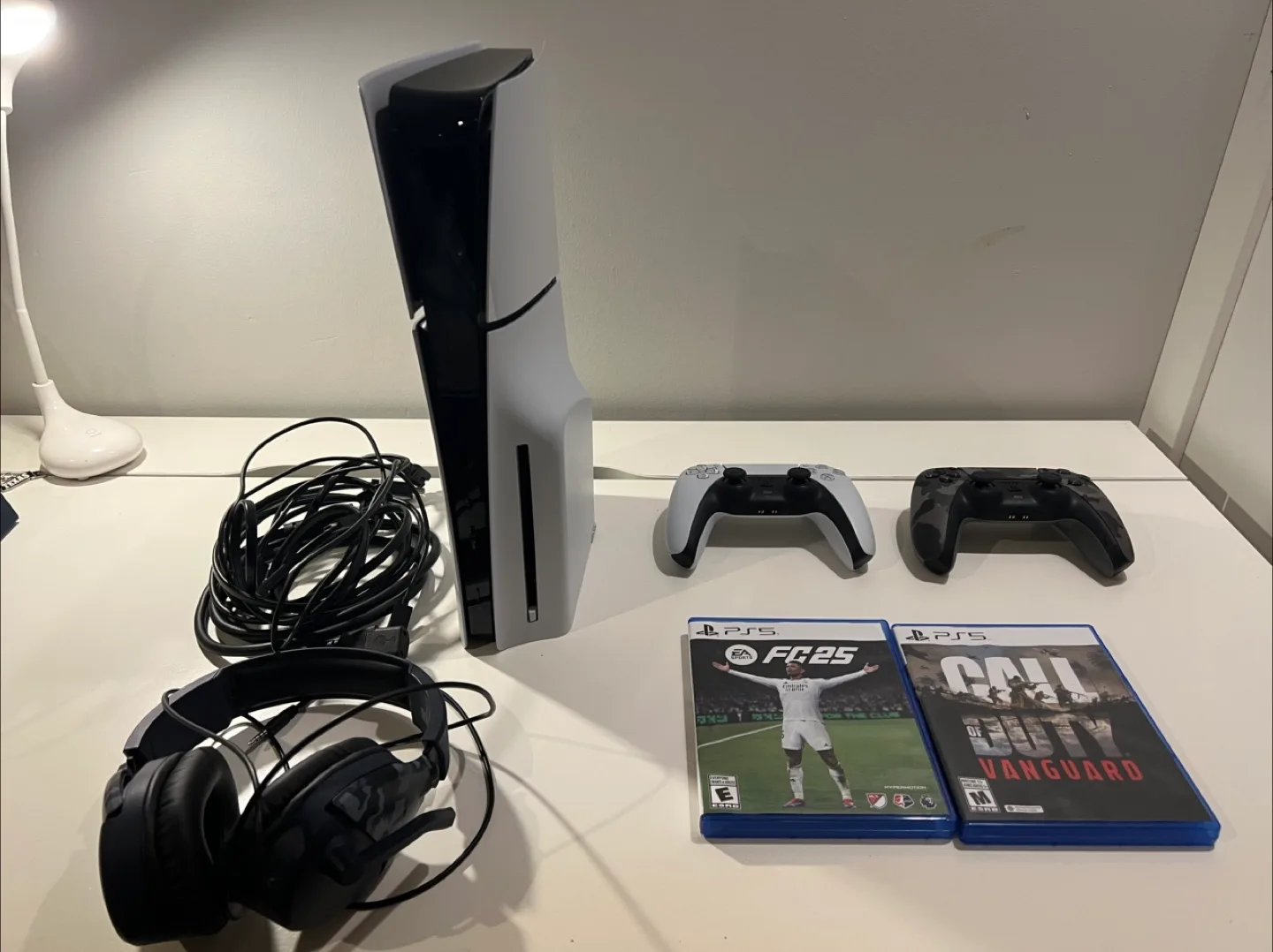 PS5 Disc Edition Console (slim) and 2 Controllers + FC25 BUNDLE thumbnail