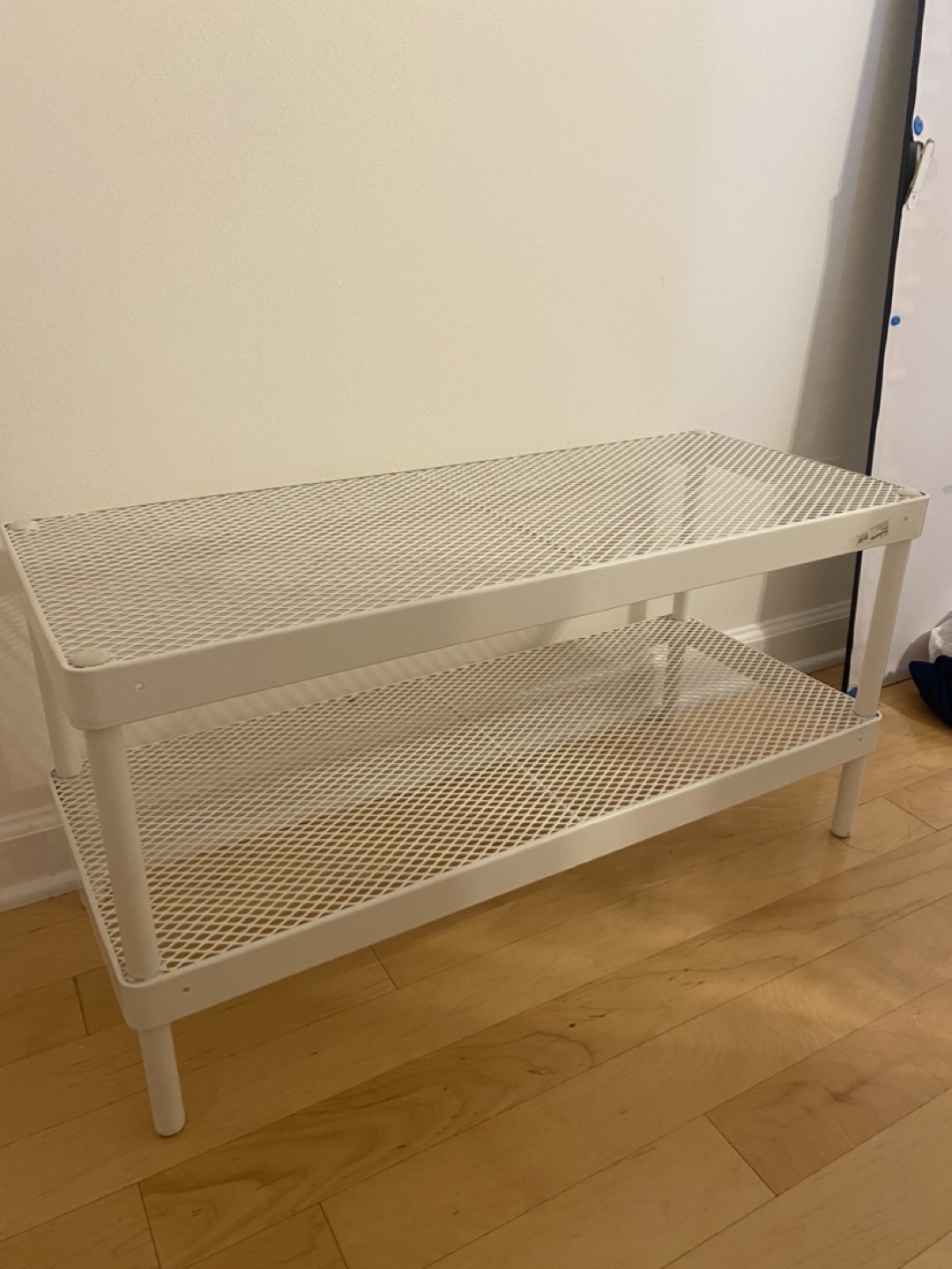 Two level white metal shoe rack