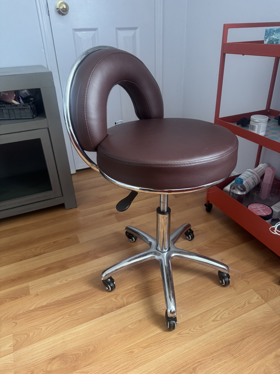 Brown Rolling Swivel Stool