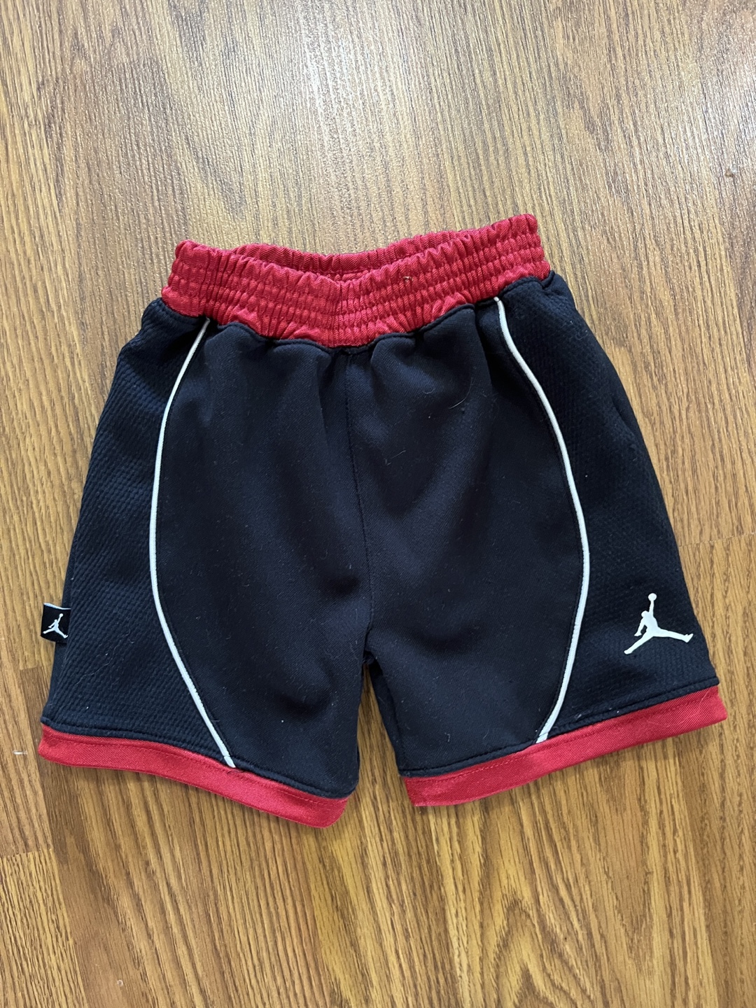 Air Jordan boys 12 months athletic shorts, black and red