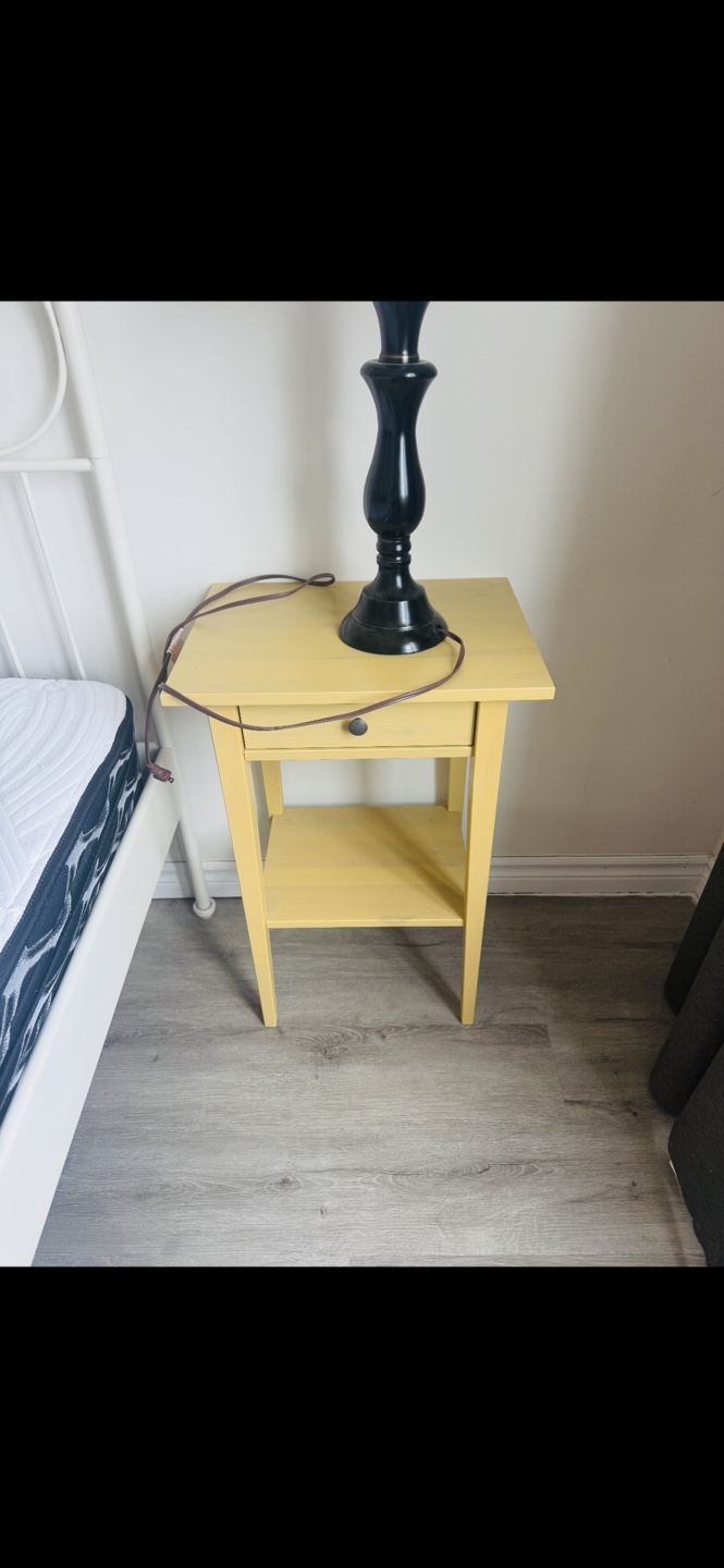 Yellow IKEA wood bedside Table