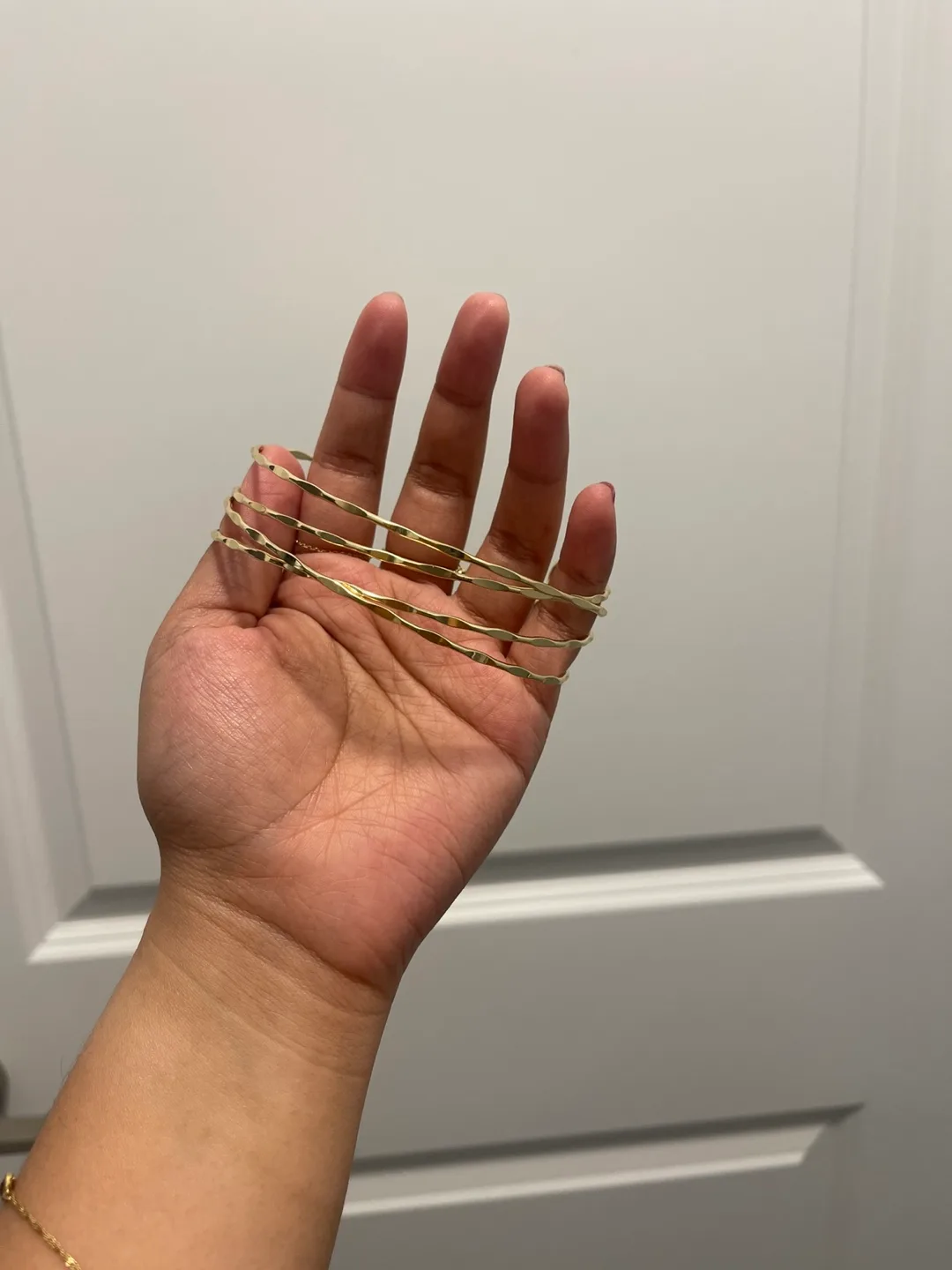 Gold arm bangles thumbnail
