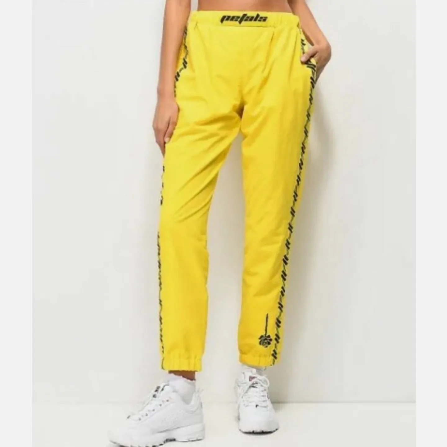 Petals by petals and peacocks yellow track pants thumbnail