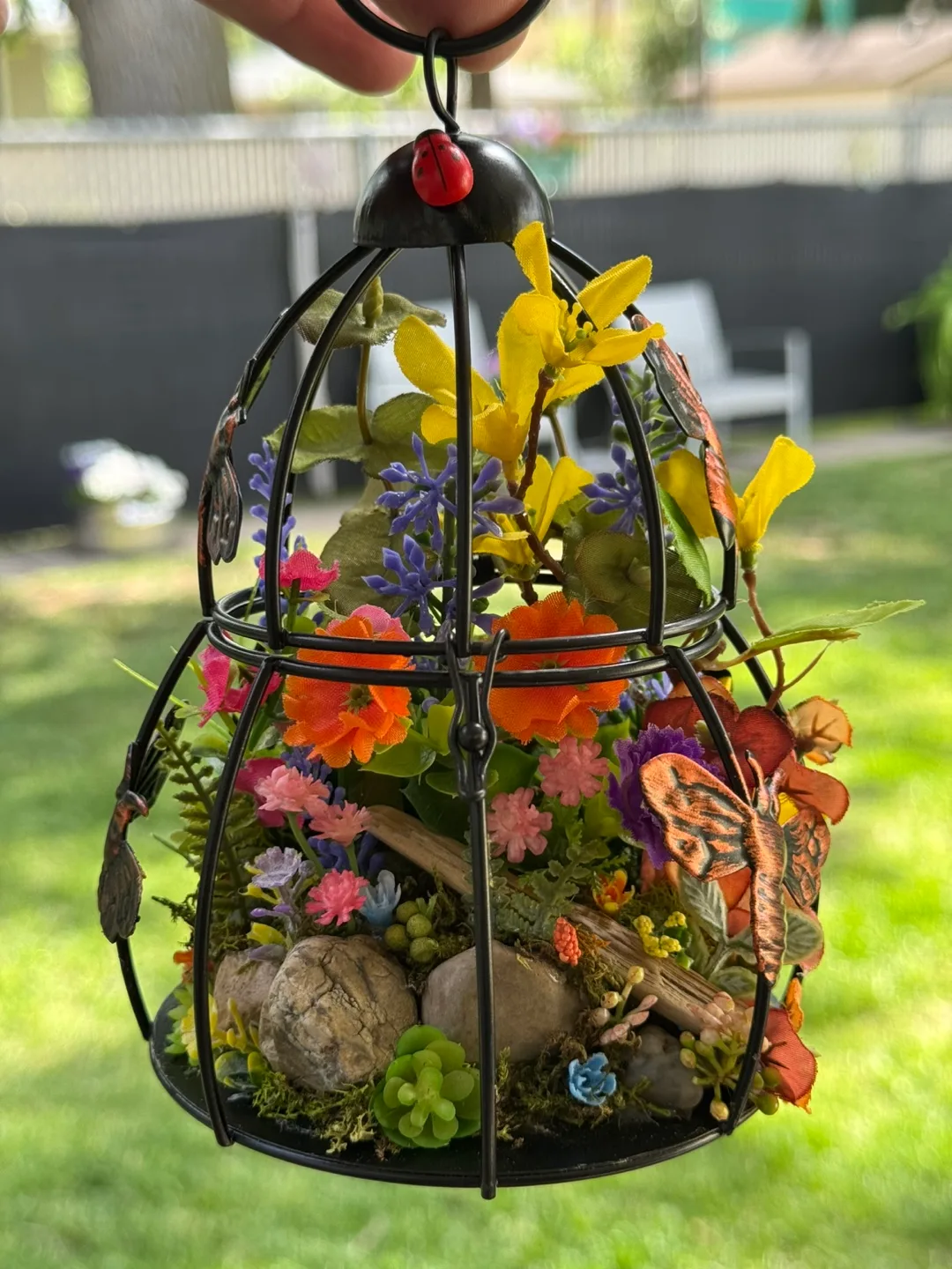 Decorative Beehive Cage with Faux Flowers thumbnail