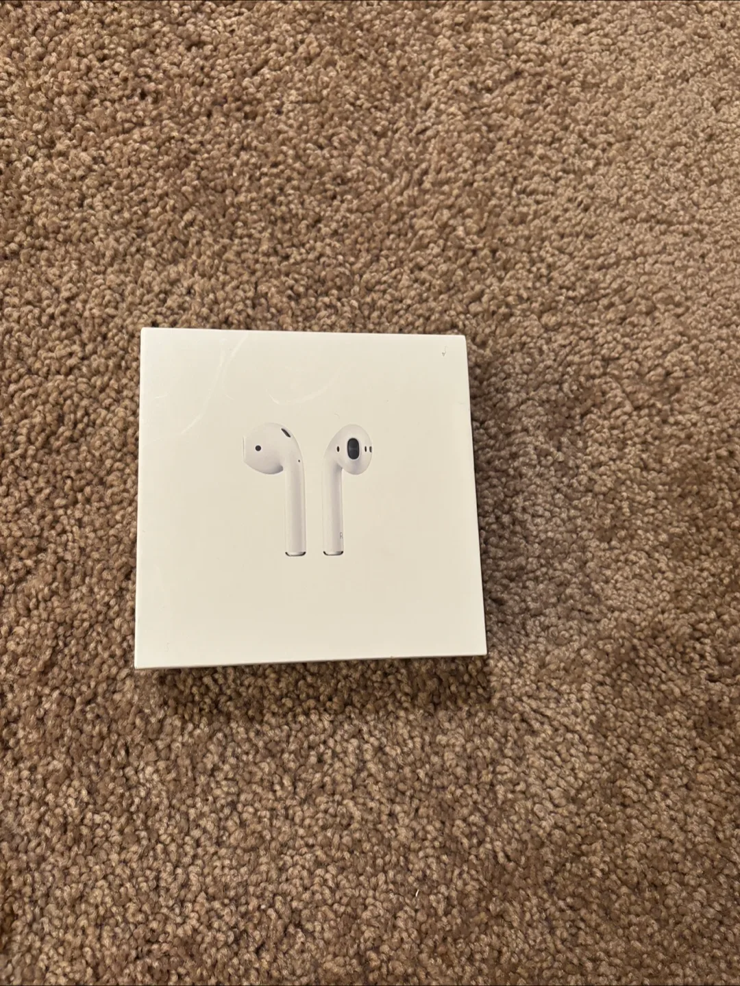 Apple AirPods with Charging Case thumbnail