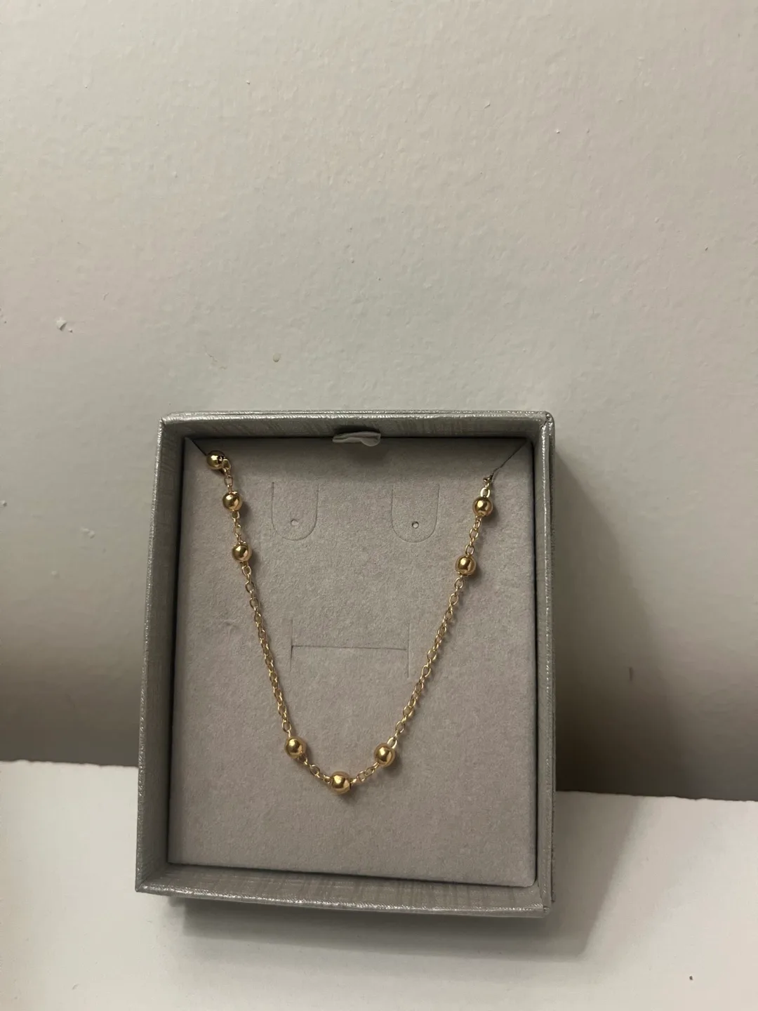 Gold beaded necklace thumbnail