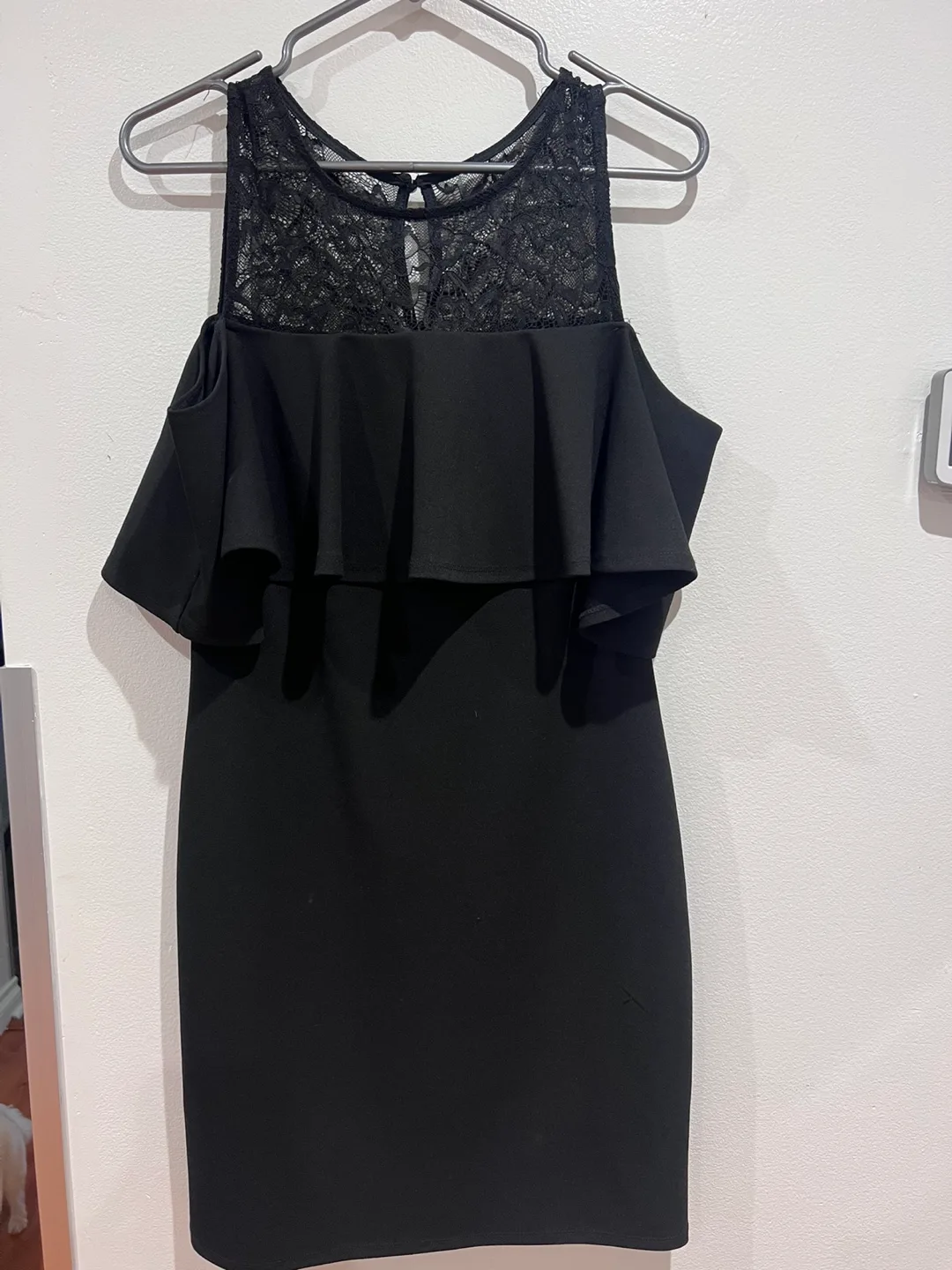 women’s black dress. thumbnail