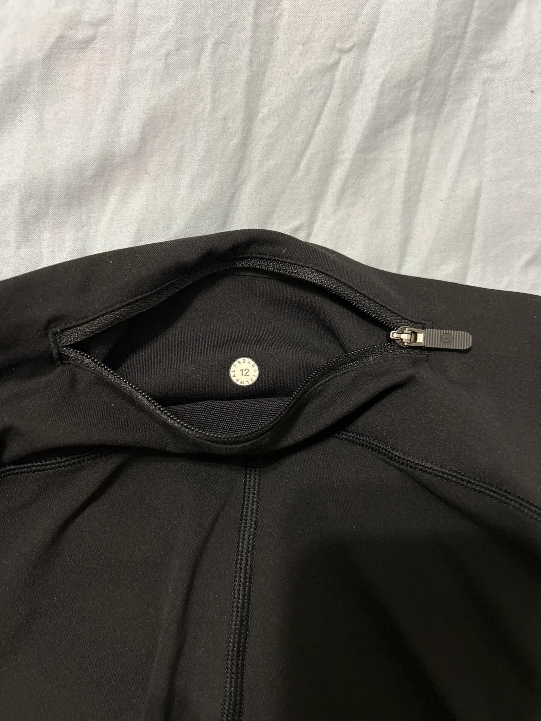 Lululemon Black Capri Leggings W Pockets - Size 12 image indicator(4)