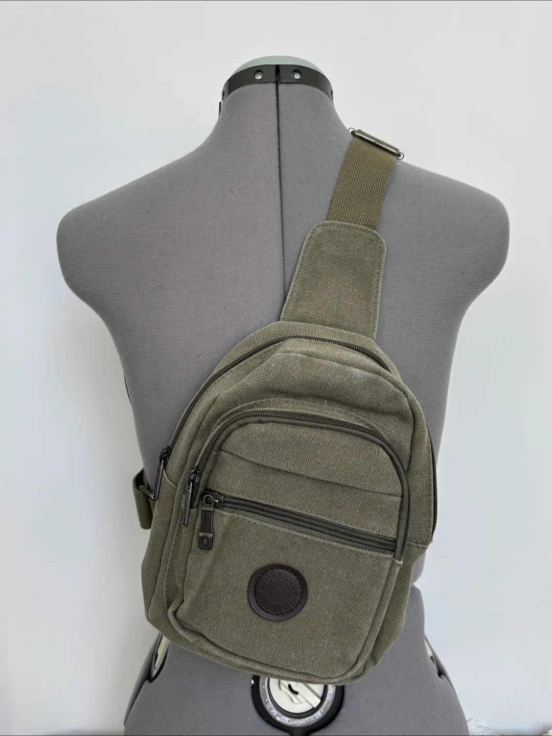 Green sling backpack 🇨🇦 thumbnail