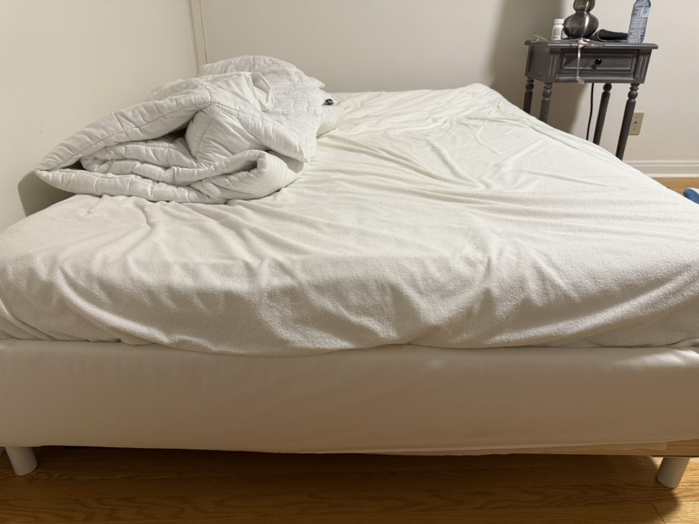 IKEA Bed frame with white linens size double including mattress