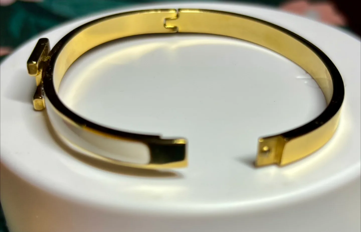 Gold & White 'H' Bangle Bracelet image indicator(3)