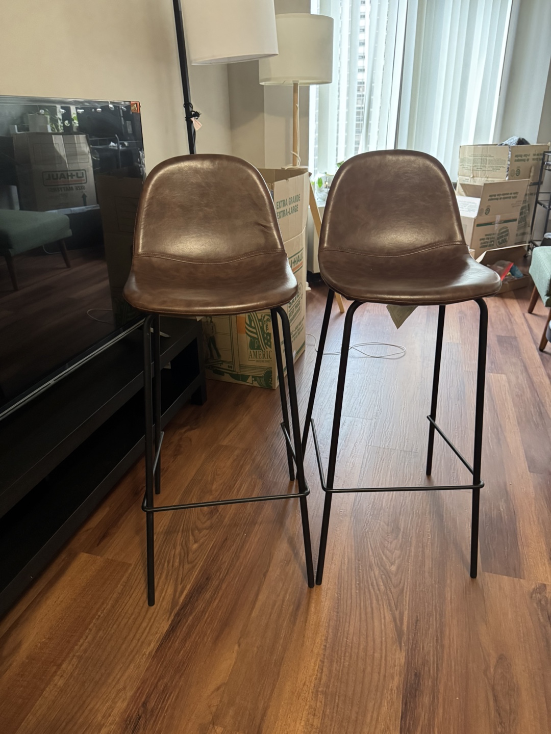 Two Brown Leather Bar Stools