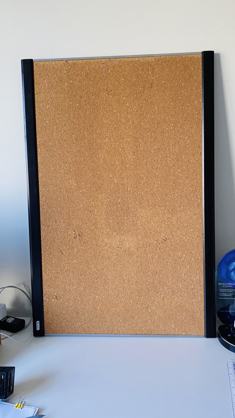 Cork board with black frame