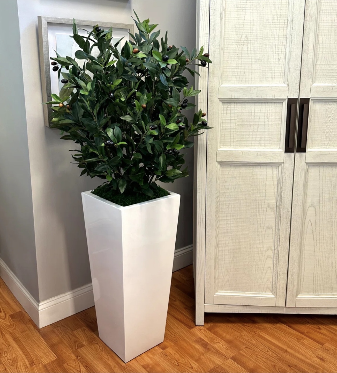 Faux olive tree in fiberstone planter