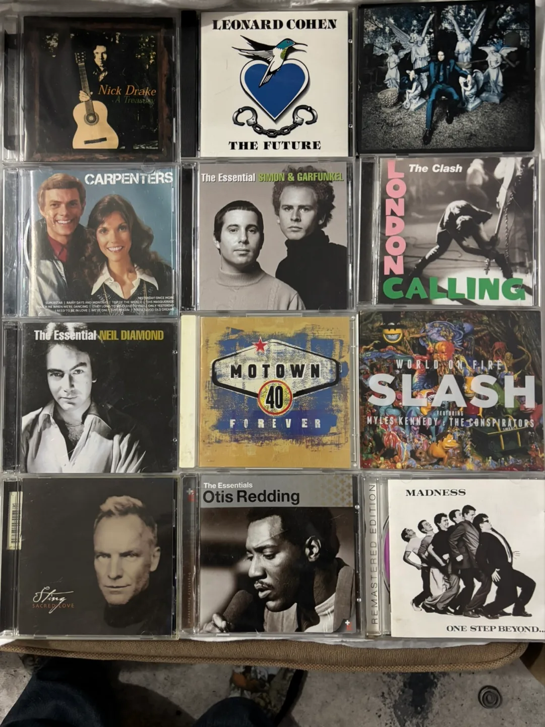 Mixed CD Collection: Nick Drake, Leonard Cohen, & More! thumbnail