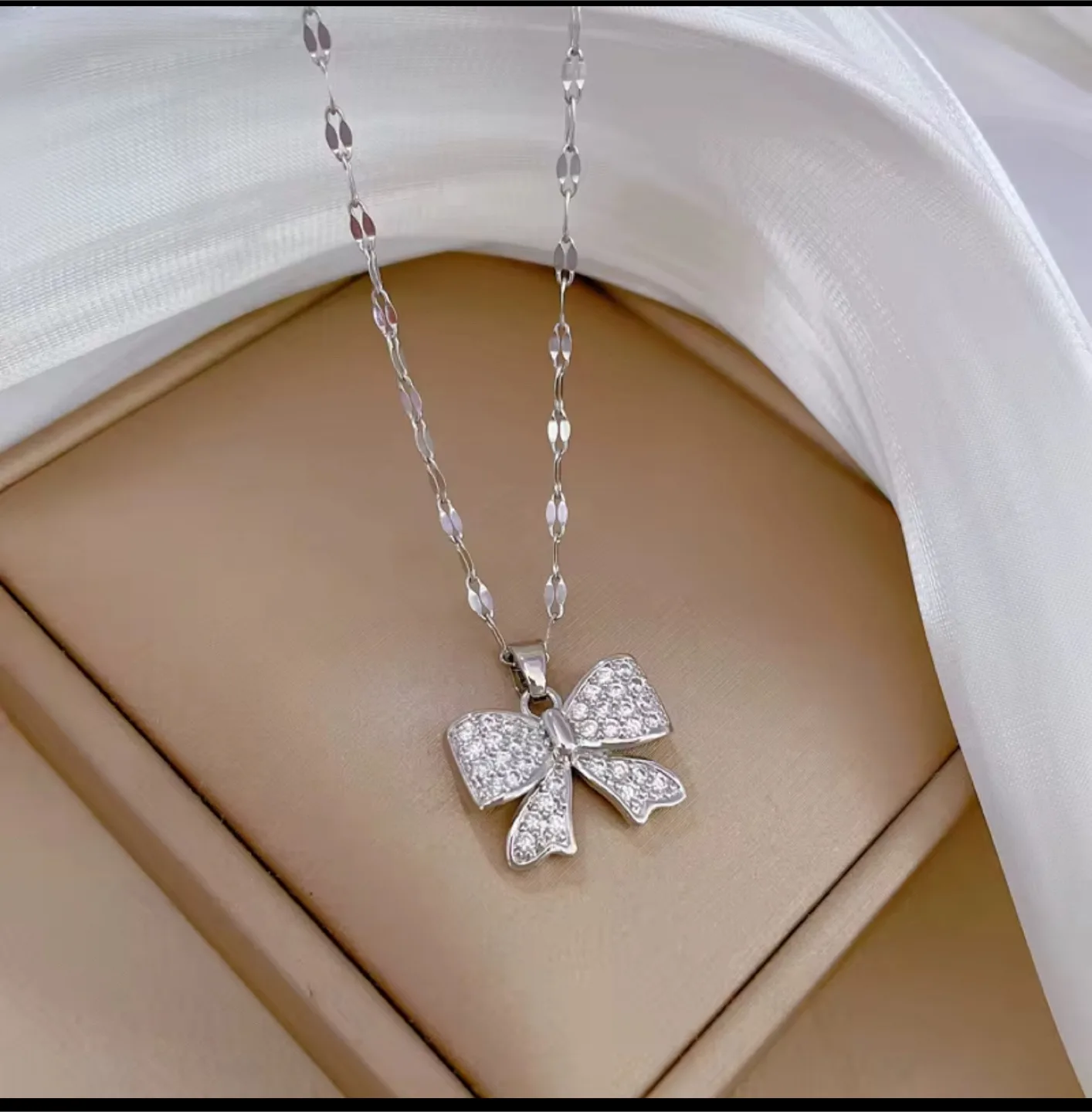 Silver Bow Pendant Necklace thumbnail